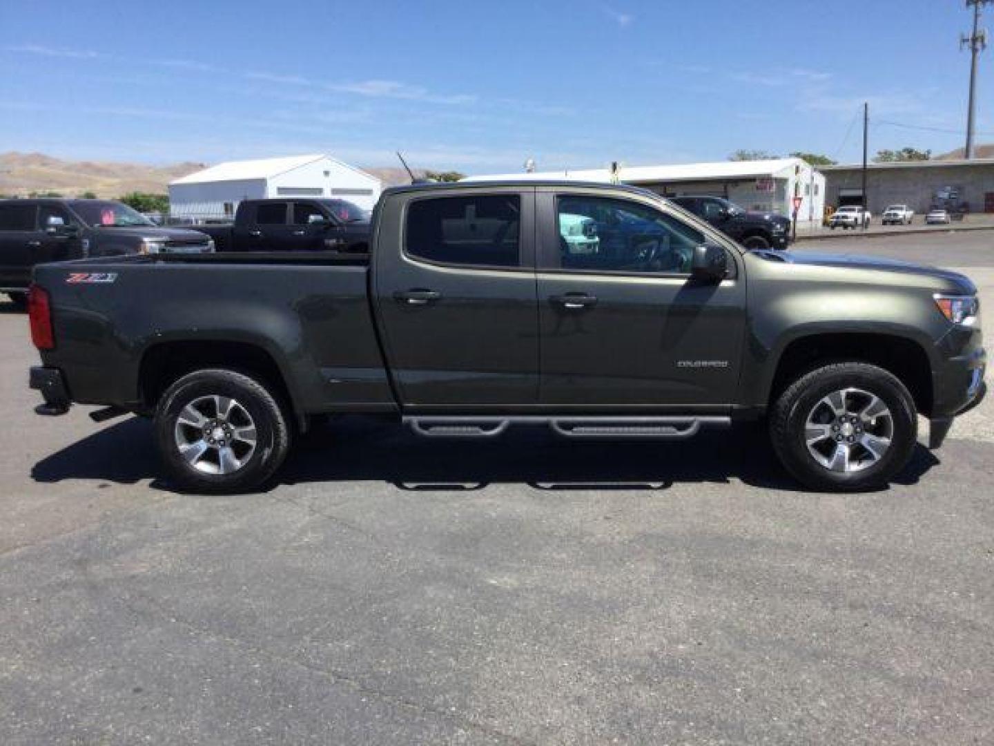 2018 Deepwood Green Metallic /Jet Black, leatherette/cloth Chevrolet Colorado Z71 Crew Cab 4WD Long Box (1GCGTDEN8J1) with an 3.6L V6 DOHC 24V GAS engine, 6-Speed Automatic transmission, located at 1801 Main Street, Lewiston, 83501, (208) 743-9371, 46.417065, -117.004799 - Photo#13