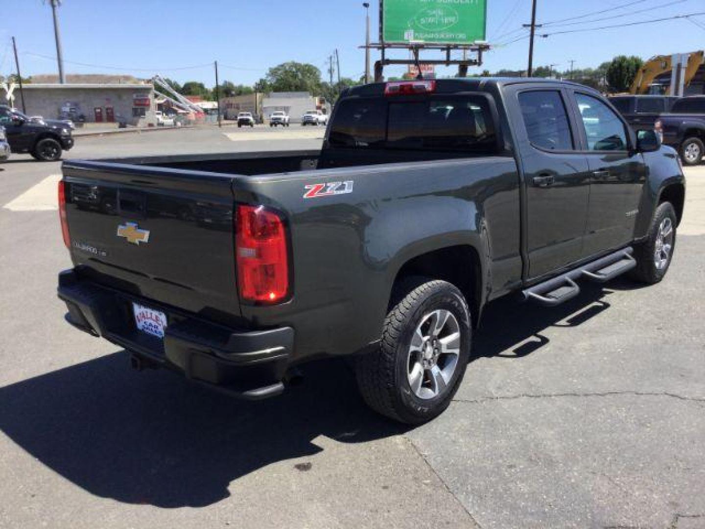 2018 Deepwood Green Metallic /Jet Black, leatherette/cloth Chevrolet Colorado Z71 Crew Cab 4WD Long Box (1GCGTDEN8J1) with an 3.6L V6 DOHC 24V GAS engine, 6-Speed Automatic transmission, located at 1801 Main Street, Lewiston, 83501, (208) 743-9371, 46.417065, -117.004799 - Photo#14