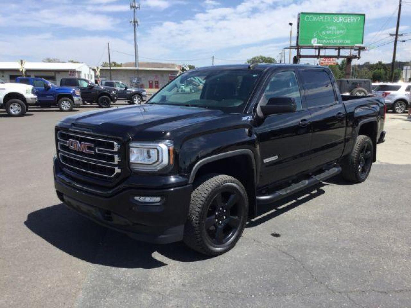 2017 Onyx Black /Dark Ash Seats w/Jet Black Interior Accents, cloth GMC Sierra 1500 SLE Crew Cab Short Box 4WD (3GTU2MEC1HG) with an 5.3L V8 OHV 16V engine, 6-Speed Automatic transmission, located at 1801 Main Street, Lewiston, 83501, (208) 743-9371, 46.417065, -117.004799 - Photo#0