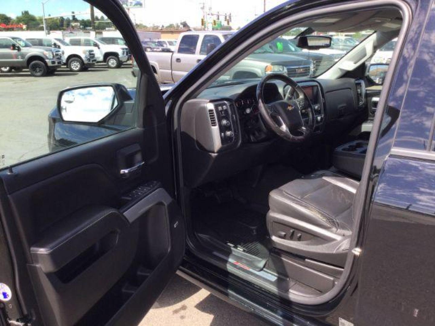 2018 Black /Jet Black, leather Chevrolet Silverado 1500 LT Crew Cab Long Box 4WD (1GCUKREC9JF) with an 5.3L V8 OHV 16V engine, 6-Speed Automatic transmission, located at 1801 Main Street, Lewiston, 83501, (208) 743-9371, 46.417065, -117.004799 - Photo#16