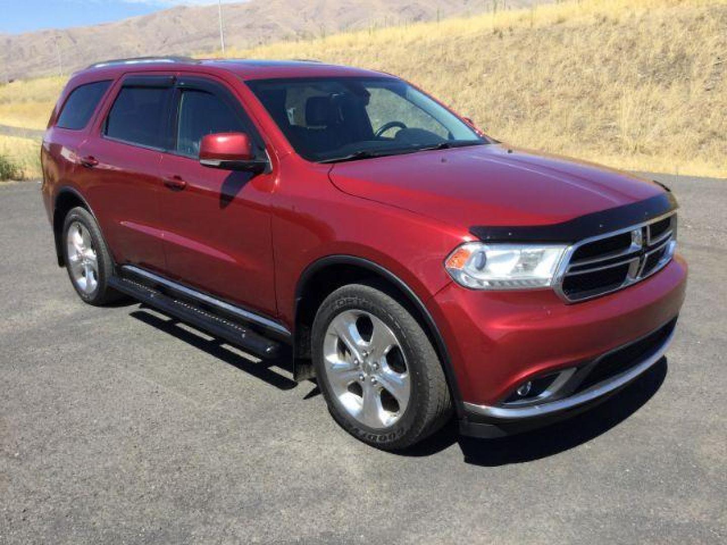 2014 Dp Cherry Red Crystal PC /Black Dodge Durango Limited AWD (1C4RDJDG8EC) with an 3.6L V6 DOHC 24V engine, 8-Speed Automatic transmission, located at 1801 Main Street, Lewiston, 83501, (208) 743-9371, 46.417065, -117.004799 - Photo#14