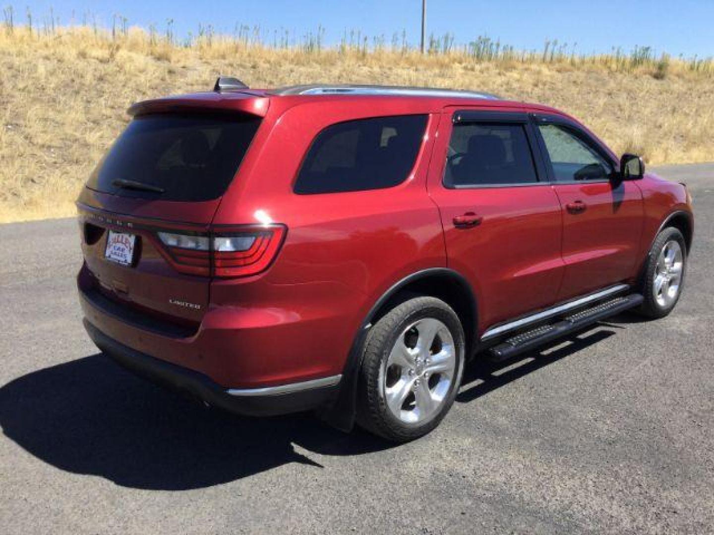 2014 Dp Cherry Red Crystal PC /Black Dodge Durango Limited AWD (1C4RDJDG8EC) with an 3.6L V6 DOHC 24V engine, 8-Speed Automatic transmission, located at 1801 Main Street, Lewiston, 83501, (208) 743-9371, 46.417065, -117.004799 - Photo#16