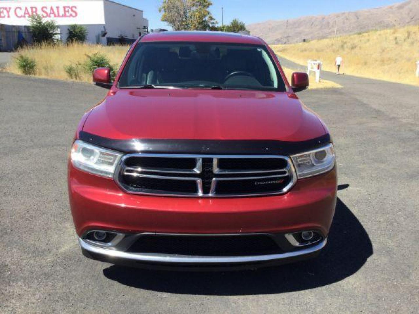 2014 Dp Cherry Red Crystal PC /Black Dodge Durango Limited AWD (1C4RDJDG8EC) with an 3.6L V6 DOHC 24V engine, 8-Speed Automatic transmission, located at 1801 Main Street, Lewiston, 83501, (208) 743-9371, 46.417065, -117.004799 - Photo#4