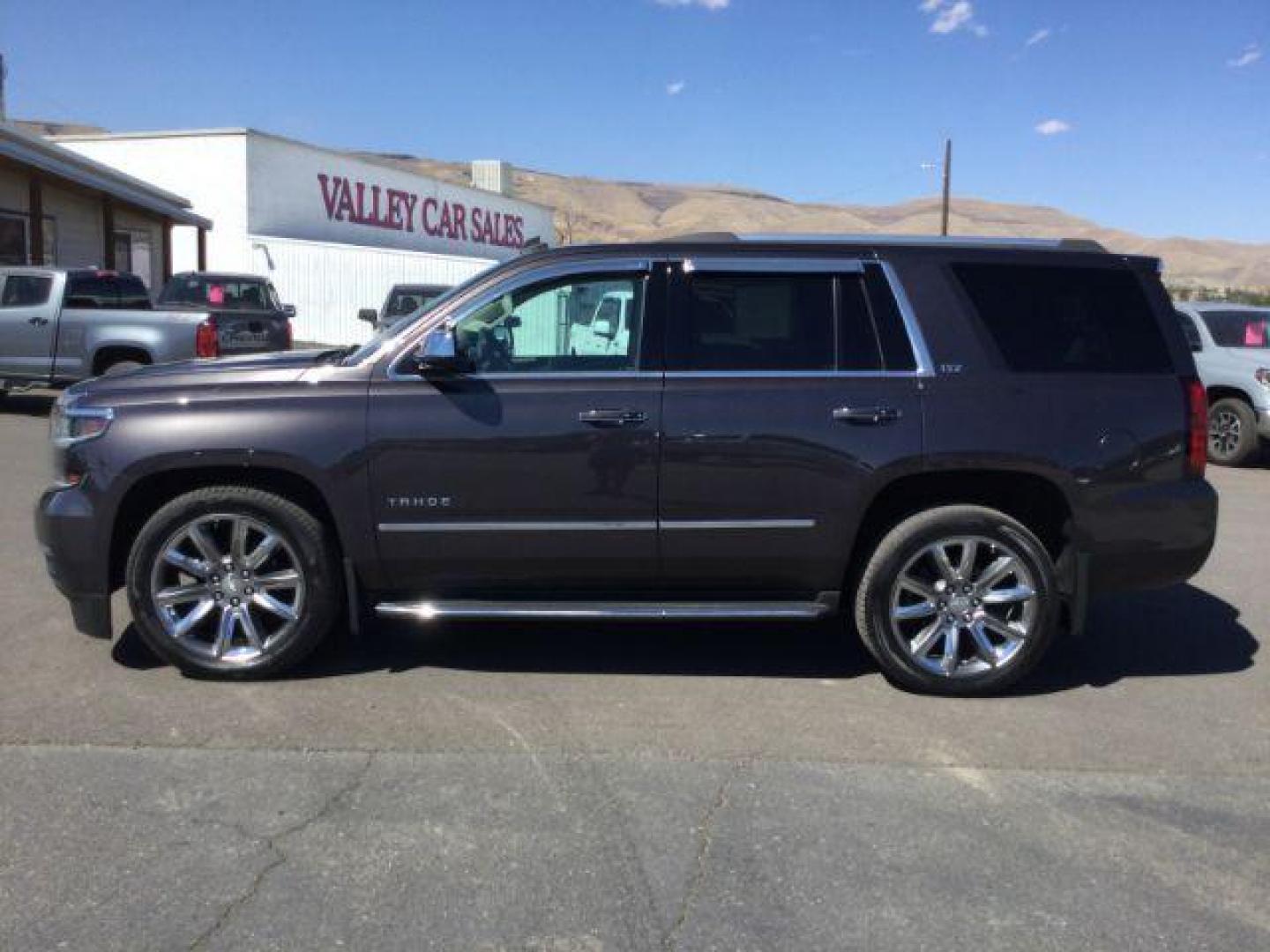 2015 GRAY /Medium Brown Leather Chevrolet Tahoe LTZ 4WD (1GNSKCKC8FR) with an 5.3L V8 OHV 16V engine, 6-Speed Automatic transmission, located at 1801 Main Street, Lewiston, 83501, (208) 743-9371, 46.417065, -117.004799 - Photo#1