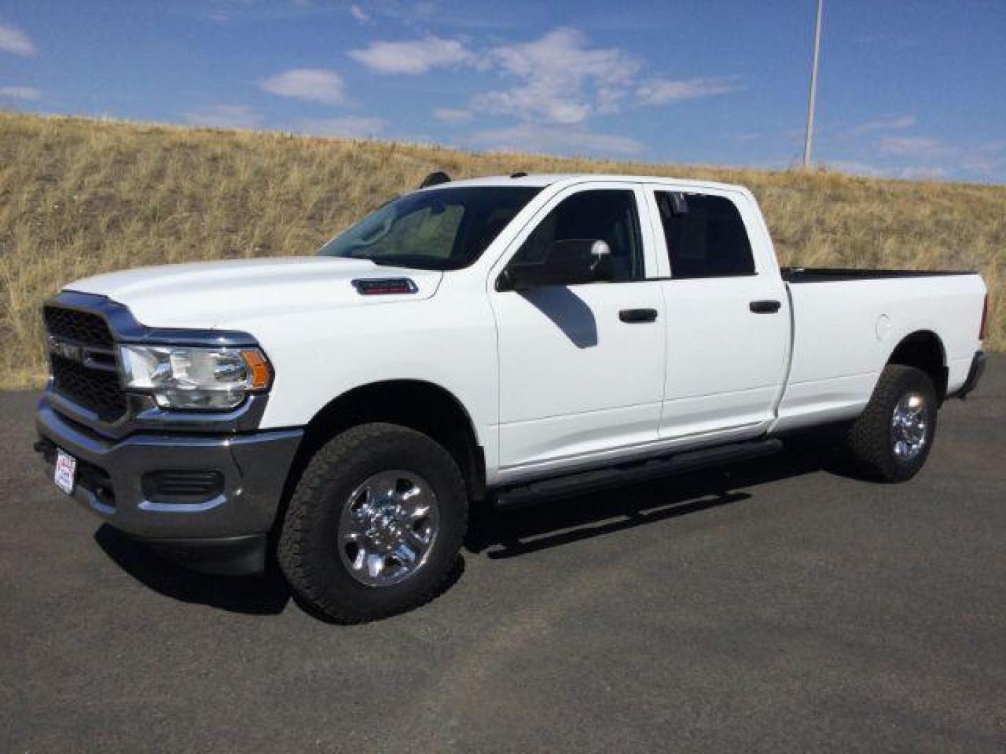 2019 Bright White Clear Coat /Black, cloth RAM 3500 Tradesman Crew Cab 4WD (3C63R3GL3KG) with an 6.7L L6 OHV 24V TURBO DIESEL engine, 6-Speed Automatic transmission, located at 1801 Main Street, Lewiston, 83501, (208) 743-9371, 46.417065, -117.004799 - Photo#0