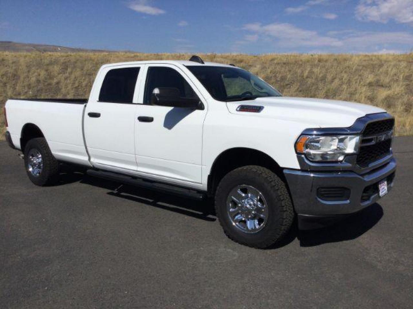 2019 Bright White Clear Coat /Black, cloth RAM 3500 Tradesman Crew Cab 4WD (3C63R3GL3KG) with an 6.7L L6 OHV 24V TURBO DIESEL engine, 6-Speed Automatic transmission, located at 1801 Main Street, Lewiston, 83501, (208) 743-9371, 46.417065, -117.004799 - Photo#10