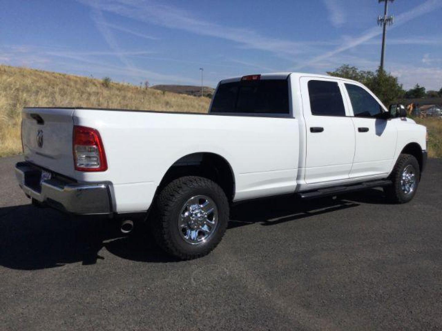 2019 Bright White Clear Coat /Black, cloth RAM 3500 Tradesman Crew Cab 4WD (3C63R3GL3KG) with an 6.7L L6 OHV 24V TURBO DIESEL engine, 6-Speed Automatic transmission, located at 1801 Main Street, Lewiston, 83501, (208) 743-9371, 46.417065, -117.004799 - Photo#12