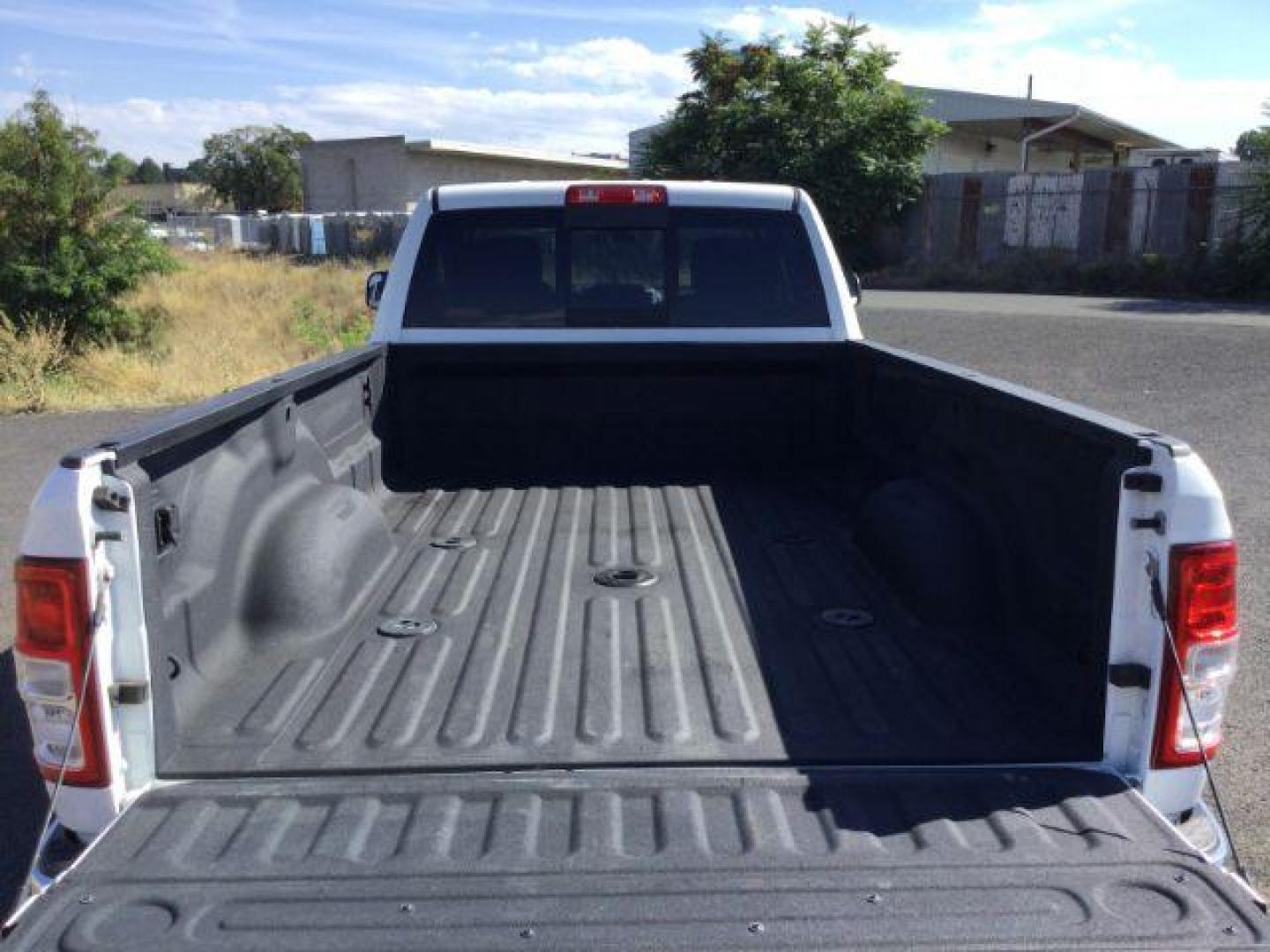 2019 Bright White Clear Coat /Black, cloth RAM 3500 Tradesman Crew Cab 4WD (3C63R3GL3KG) with an 6.7L L6 OHV 24V TURBO DIESEL engine, 6-Speed Automatic transmission, located at 1801 Main Street, Lewiston, 83501, (208) 743-9371, 46.417065, -117.004799 - Photo#14