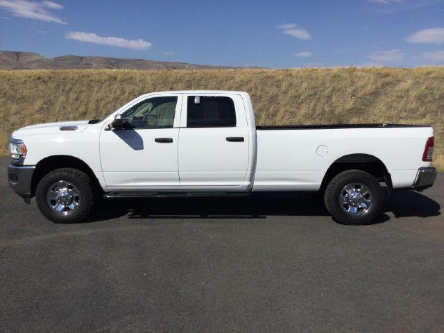 2019 Bright White Clear Coat /Black, cloth RAM 3500 Tradesman Crew Cab 4WD (3C63R3GL3KG) with an 6.7L L6 OHV 24V TURBO DIESEL engine, 6-Speed Automatic transmission, located at 1801 Main Street, Lewiston, 83501, (208) 743-9371, 46.417065, -117.004799 - Photo#1