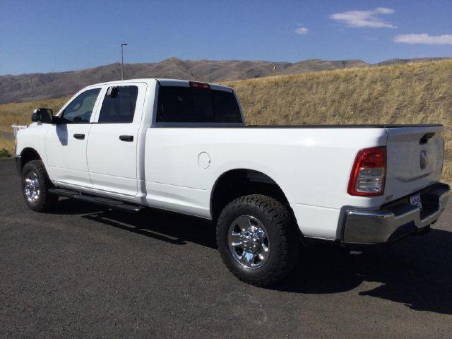 2019 Bright White Clear Coat /Black, cloth RAM 3500 Tradesman Crew Cab 4WD (3C63R3GL3KG) with an 6.7L L6 OHV 24V TURBO DIESEL engine, 6-Speed Automatic transmission, located at 1801 Main Street, Lewiston, 83501, (208) 743-9371, 46.417065, -117.004799 - Photo#2