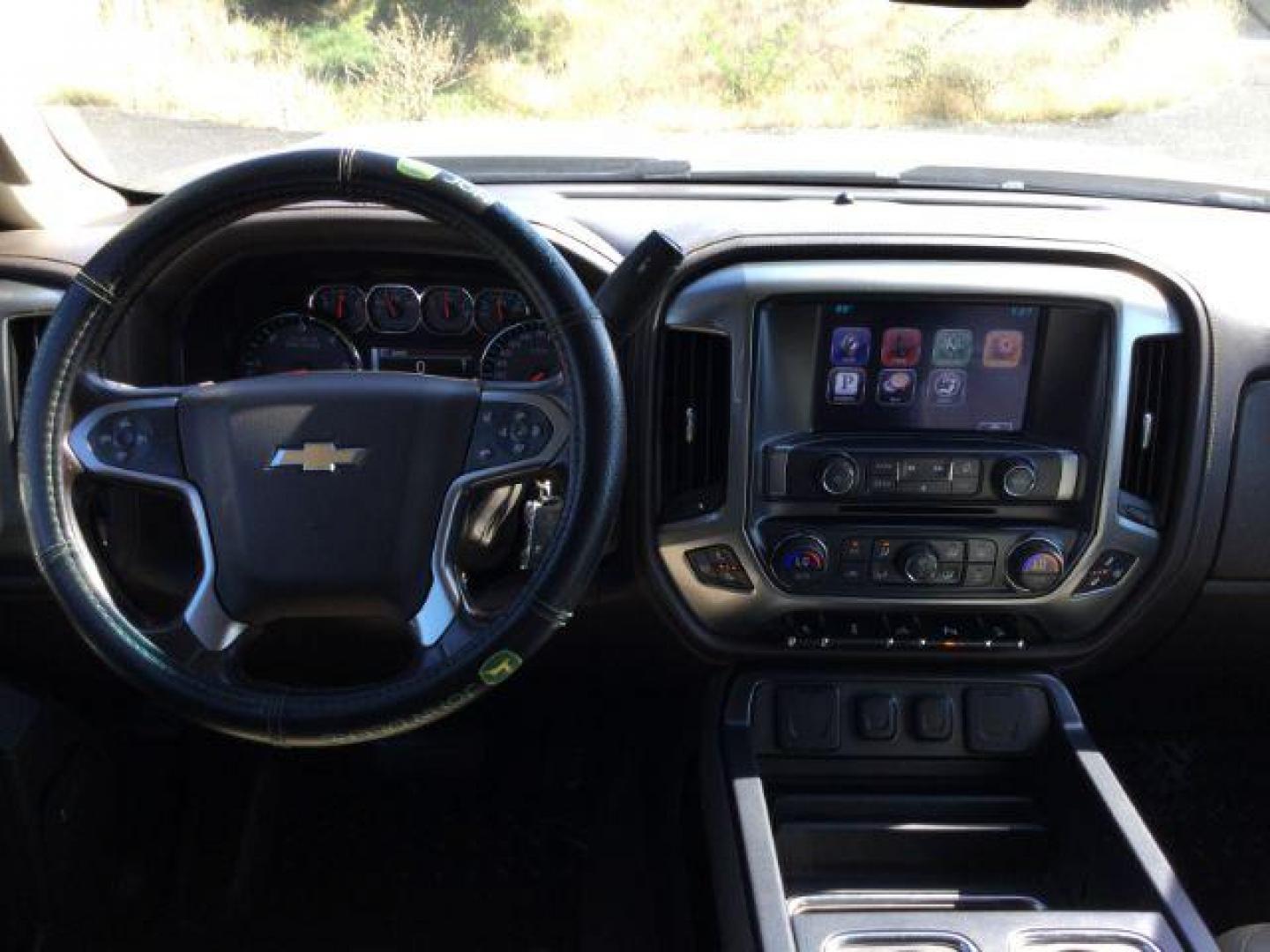 2015 Brownstone Metallic /Cocoa/Dune Chevrolet Silverado 3500HD LTZ Crew Cab 4WD (1GC1K0EG6FF) with an 6.0L V8 OHV 16V FFV engine, 6-Speed Automatic transmission, located at 1801 Main Street, Lewiston, 83501, (208) 743-9371, 46.417065, -117.004799 - Photo#12