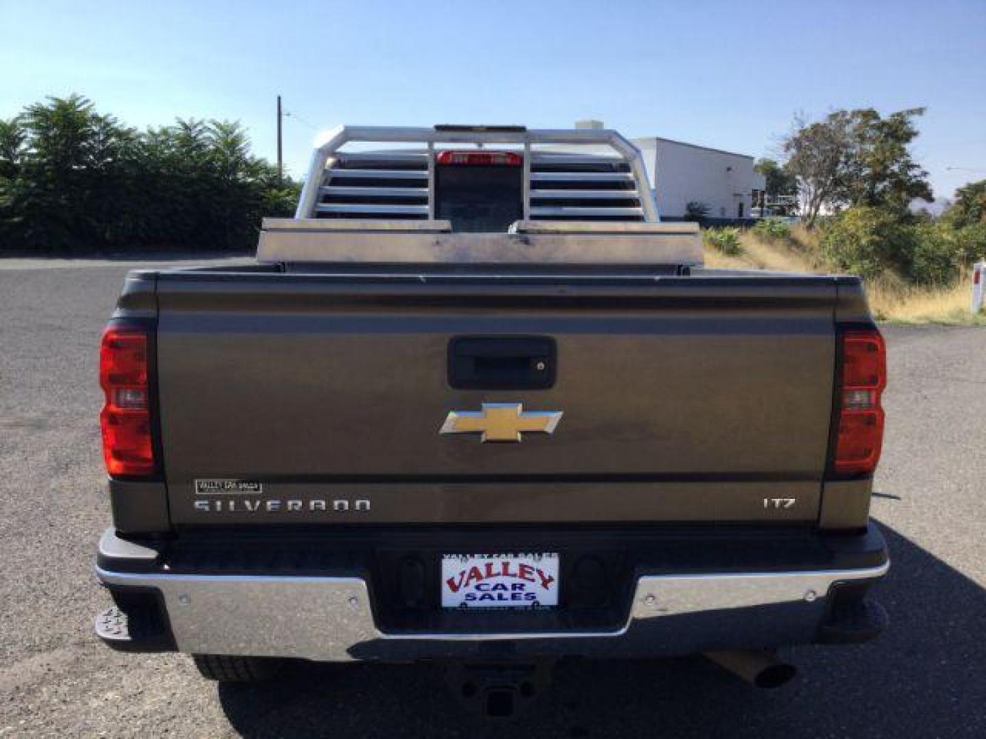 2015 Brownstone Metallic /Cocoa/Dune Chevrolet Silverado 3500HD LTZ Crew Cab 4WD (1GC1K0EG6FF) with an 6.0L V8 OHV 16V FFV engine, 6-Speed Automatic transmission, located at 1801 Main Street, Lewiston, 83501, (208) 743-9371, 46.417065, -117.004799 - Photo#15