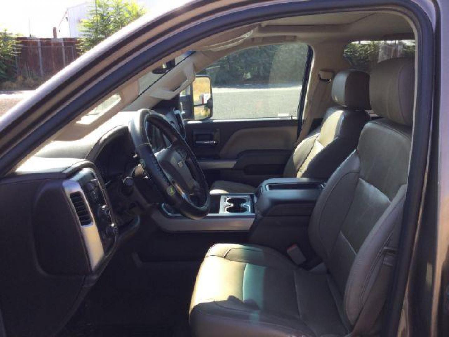 2015 Brownstone Metallic /Cocoa/Dune Chevrolet Silverado 3500HD LTZ Crew Cab 4WD (1GC1K0EG6FF) with an 6.0L V8 OHV 16V FFV engine, 6-Speed Automatic transmission, located at 1801 Main Street, Lewiston, 83501, (208) 743-9371, 46.417065, -117.004799 - Photo#3