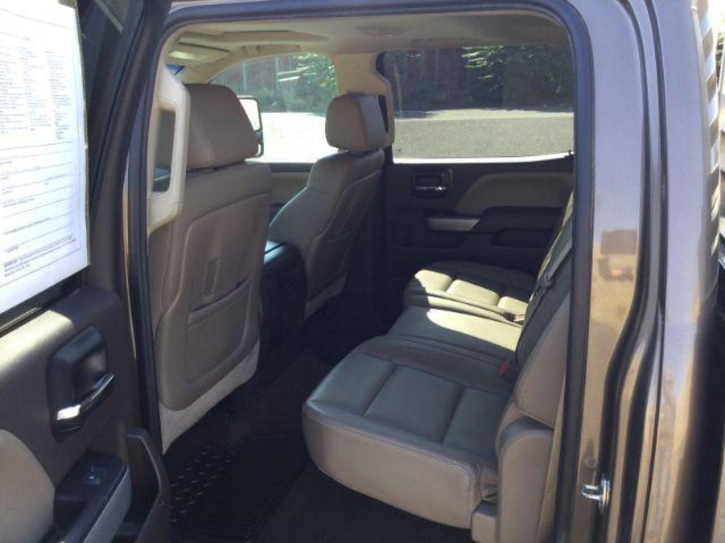 2015 Brownstone Metallic /Cocoa/Dune Chevrolet Silverado 3500HD LTZ Crew Cab 4WD (1GC1K0EG6FF) with an 6.0L V8 OHV 16V FFV engine, 6-Speed Automatic transmission, located at 1801 Main Street, Lewiston, 83501, (208) 743-9371, 46.417065, -117.004799 - Photo#4