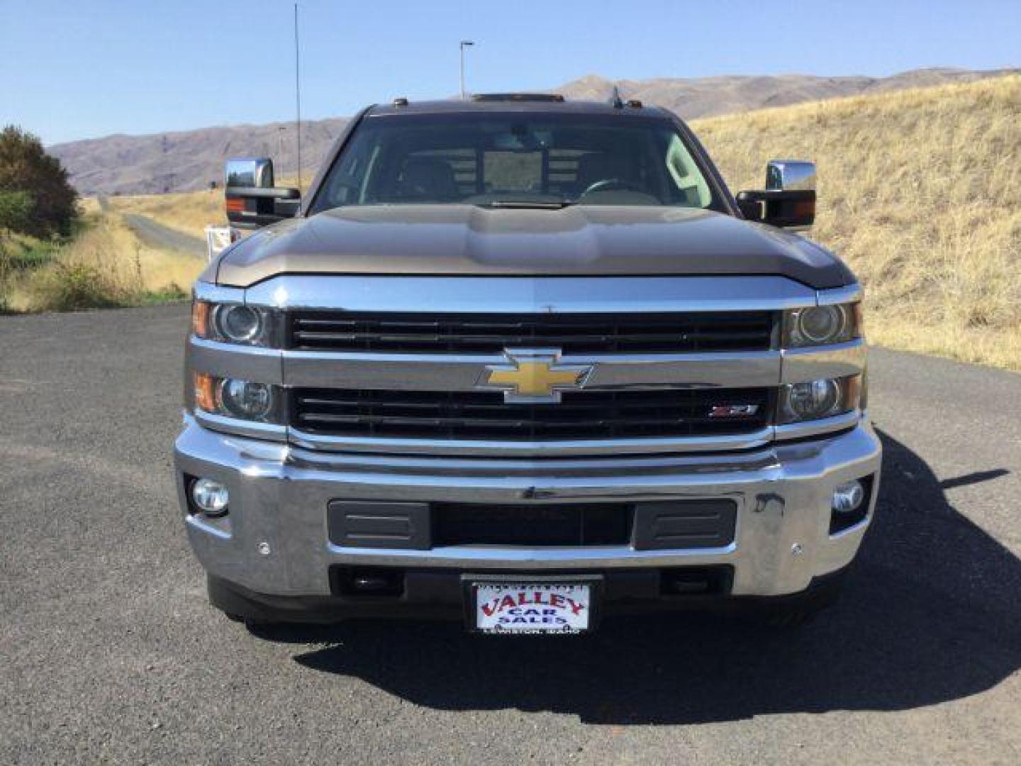 2015 Brownstone Metallic /Cocoa/Dune Chevrolet Silverado 3500HD LTZ Crew Cab 4WD (1GC1K0EG6FF) with an 6.0L V8 OHV 16V FFV engine, 6-Speed Automatic transmission, located at 1801 Main Street, Lewiston, 83501, (208) 743-9371, 46.417065, -117.004799 - Photo#6