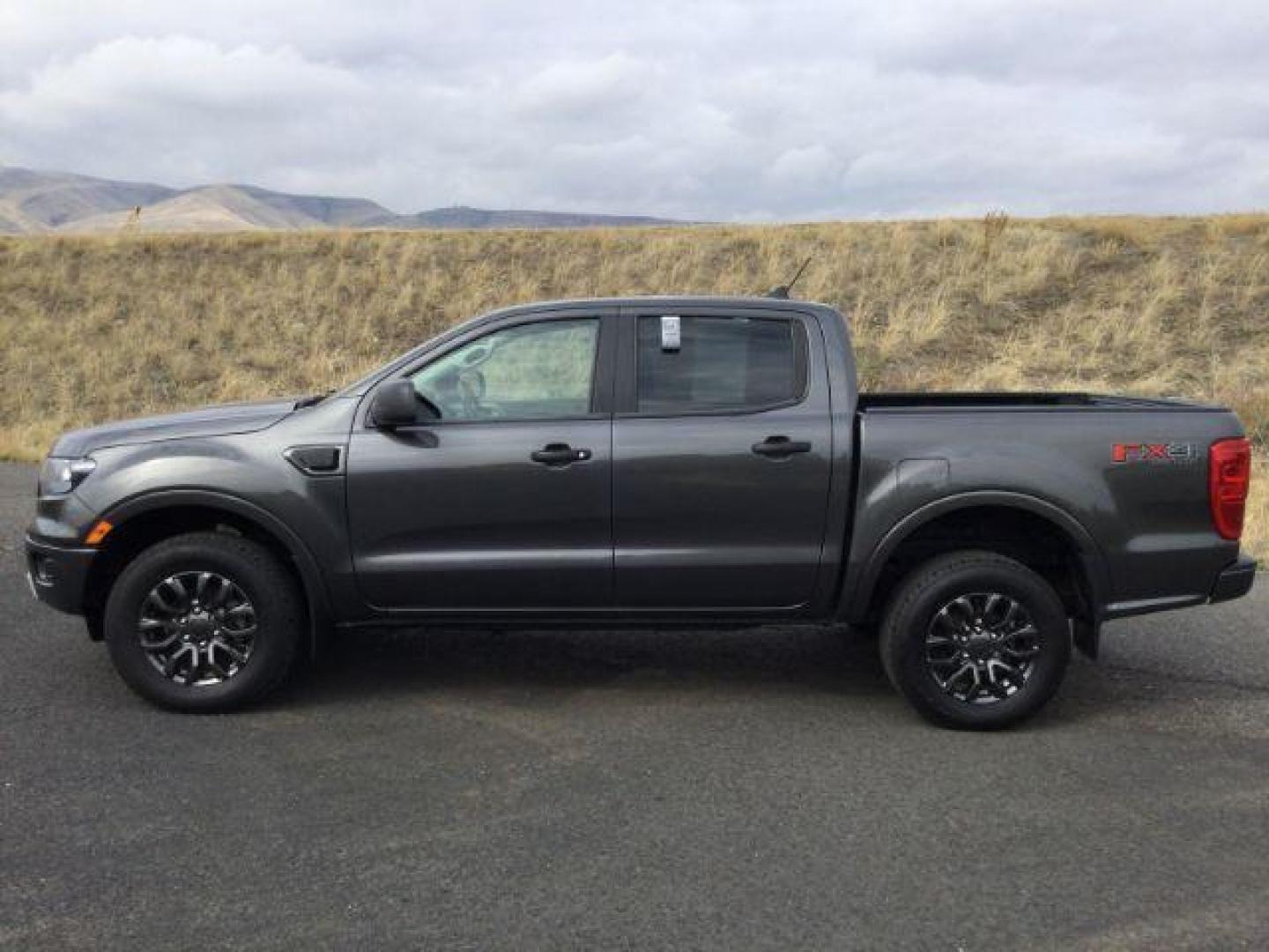 2019 Magnetic Metallic /Ebony, premium cloth Ford Ranger XLT SuperCrew 4WD (1FTER4FH7KL) with an 2.3L L4 DOHC 16V engine, 10-Speed Automatic transmission, located at 1801 Main Street, Lewiston, 83501, (208) 743-9371, 46.417065, -117.004799 - Photo#1