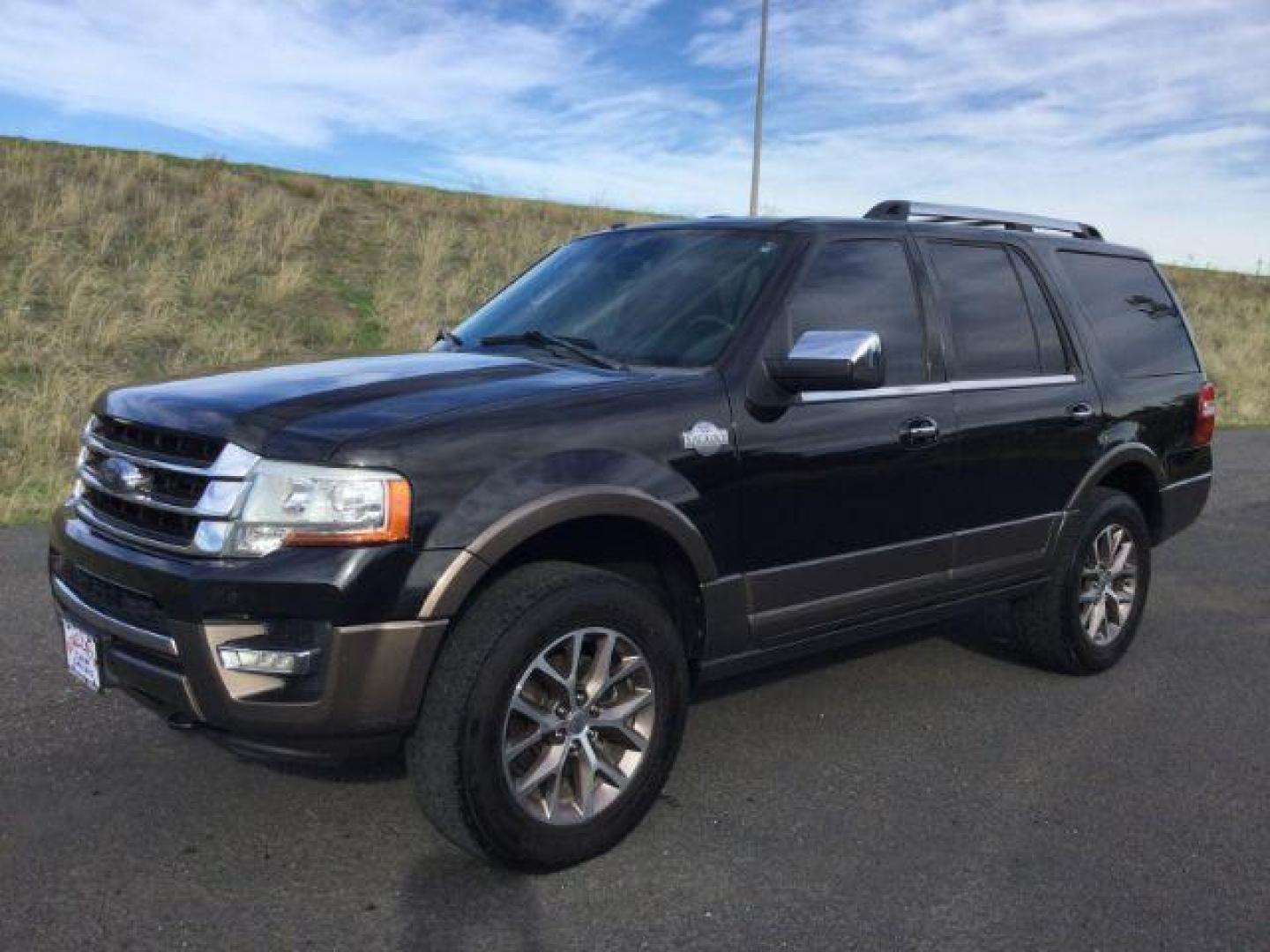 2015 Tuxedo Black Metallic /Mesa w/Ebony Ford Expedition King Ranch 4WD (1FMJU1JT5FE) with an 3.5L V6 DOHC 24V FFV engine, 6-Speed Automatic transmission, located at 1801 Main Street, Lewiston, 83501, (208) 743-9371, 46.417065, -117.004799 - Photo#0