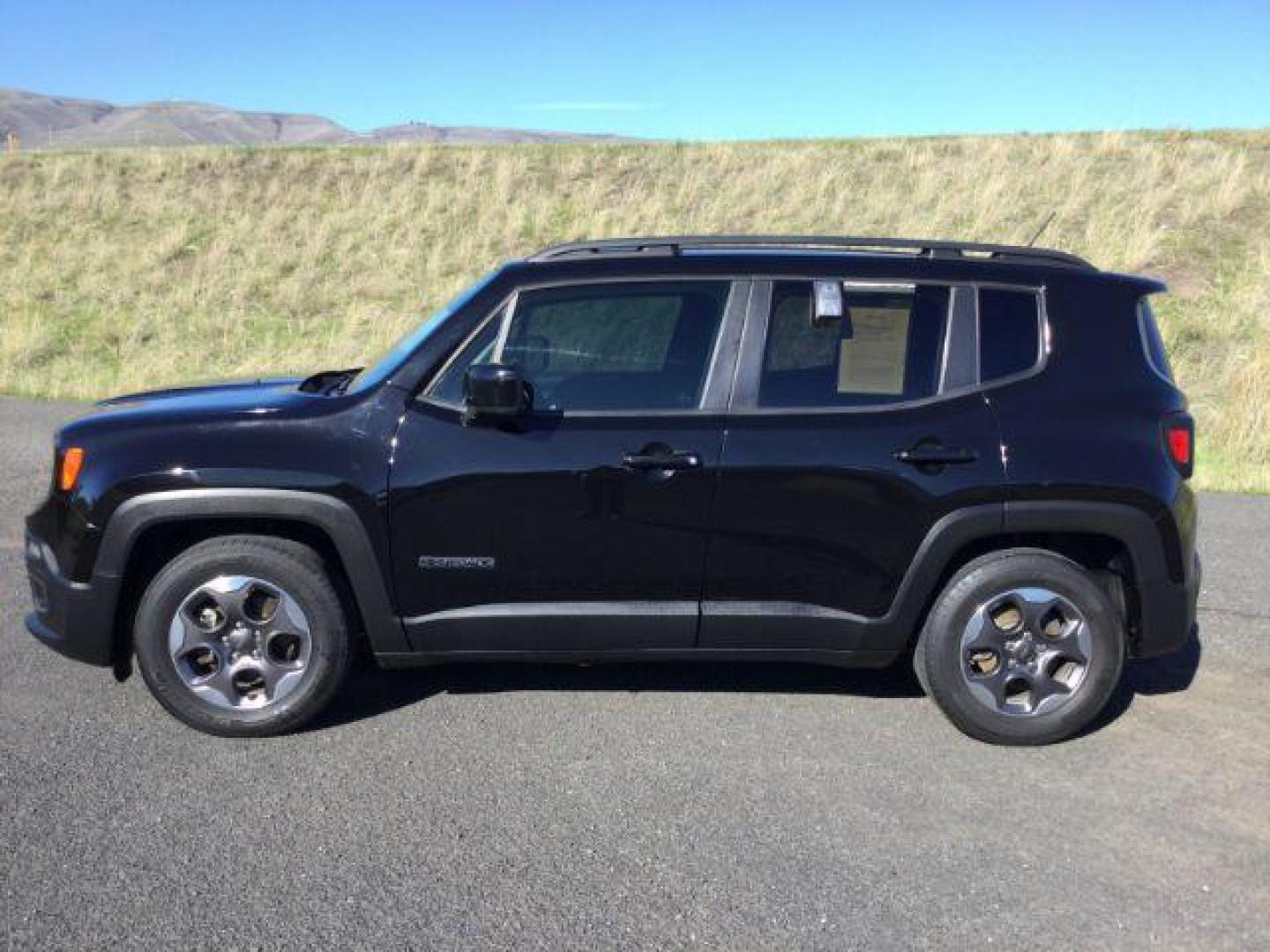 2016 Black /Black, cloth Jeep Renegade Latitude FWD (ZACCJABW8GP) with an 1.4L L4 DOHC 16V TURBO engine, 6-Speed Manual transmission, located at 1801 Main Street, Lewiston, 83501, (208) 743-9371, 46.417065, -117.004799 - Photo#1