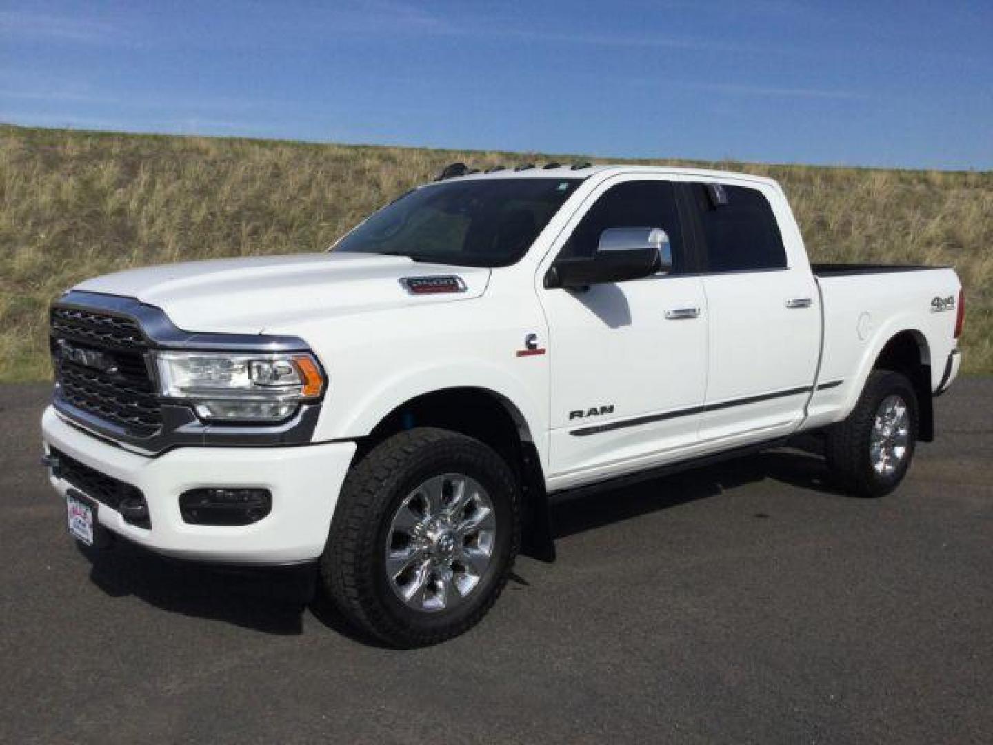 2019 Bright White Clear Coat /Black, premium leather RAM 2500 Limited Crew Cab SWB 4WD (3C6UR5SL2KG) with an 6.7L L6 OHV 24V TURBO DIESEL engine, 6-Speed Automatic transmission, located at 1801 Main Street, Lewiston, 83501, (208) 743-9371, 46.417065, -117.004799 - Photo#0