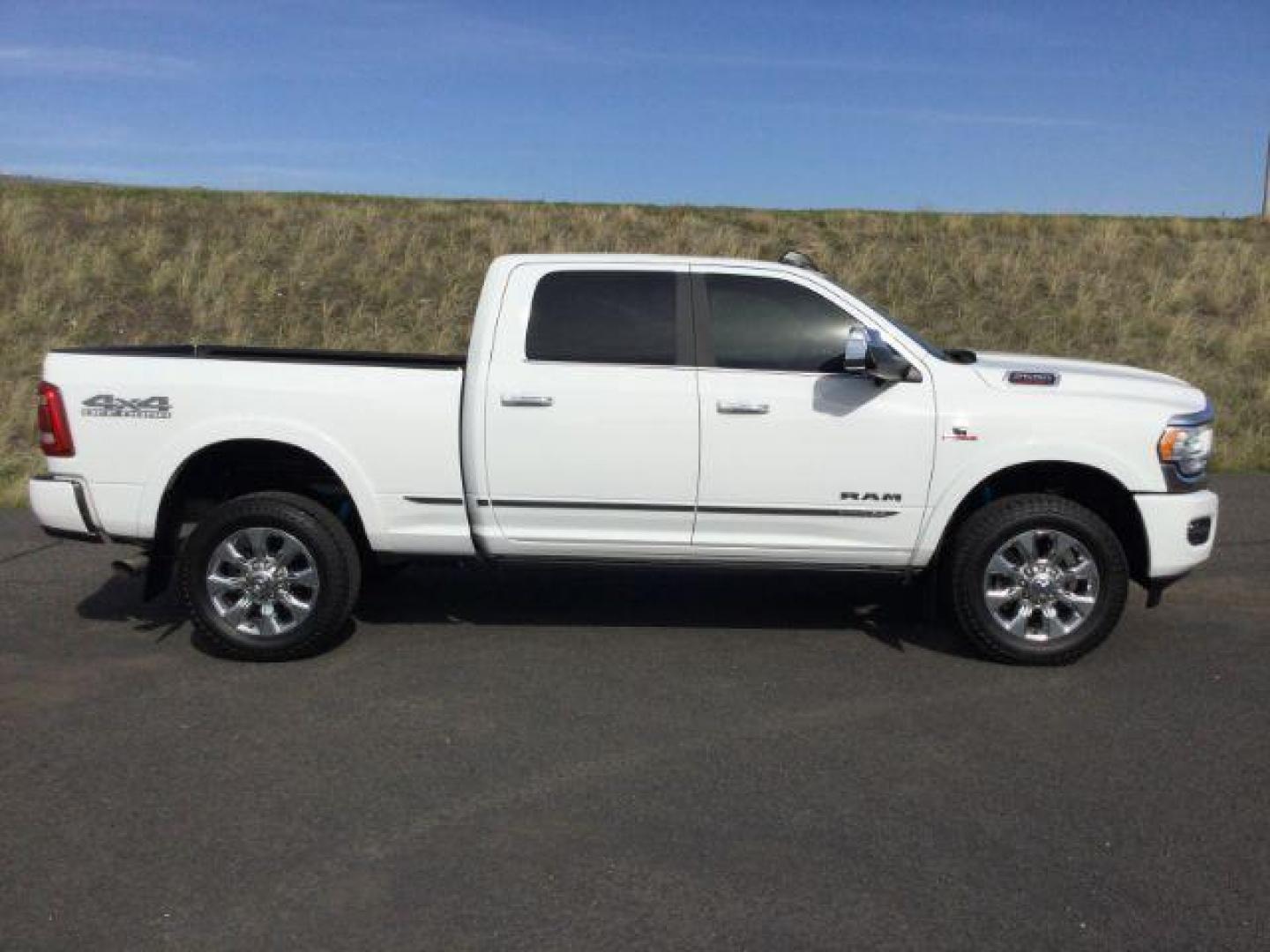 2019 Bright White Clear Coat /Black, premium leather RAM 2500 Limited Crew Cab SWB 4WD (3C6UR5SL2KG) with an 6.7L L6 OHV 24V TURBO DIESEL engine, 6-Speed Automatic transmission, located at 1801 Main Street, Lewiston, 83501, (208) 743-9371, 46.417065, -117.004799 - Photo#11