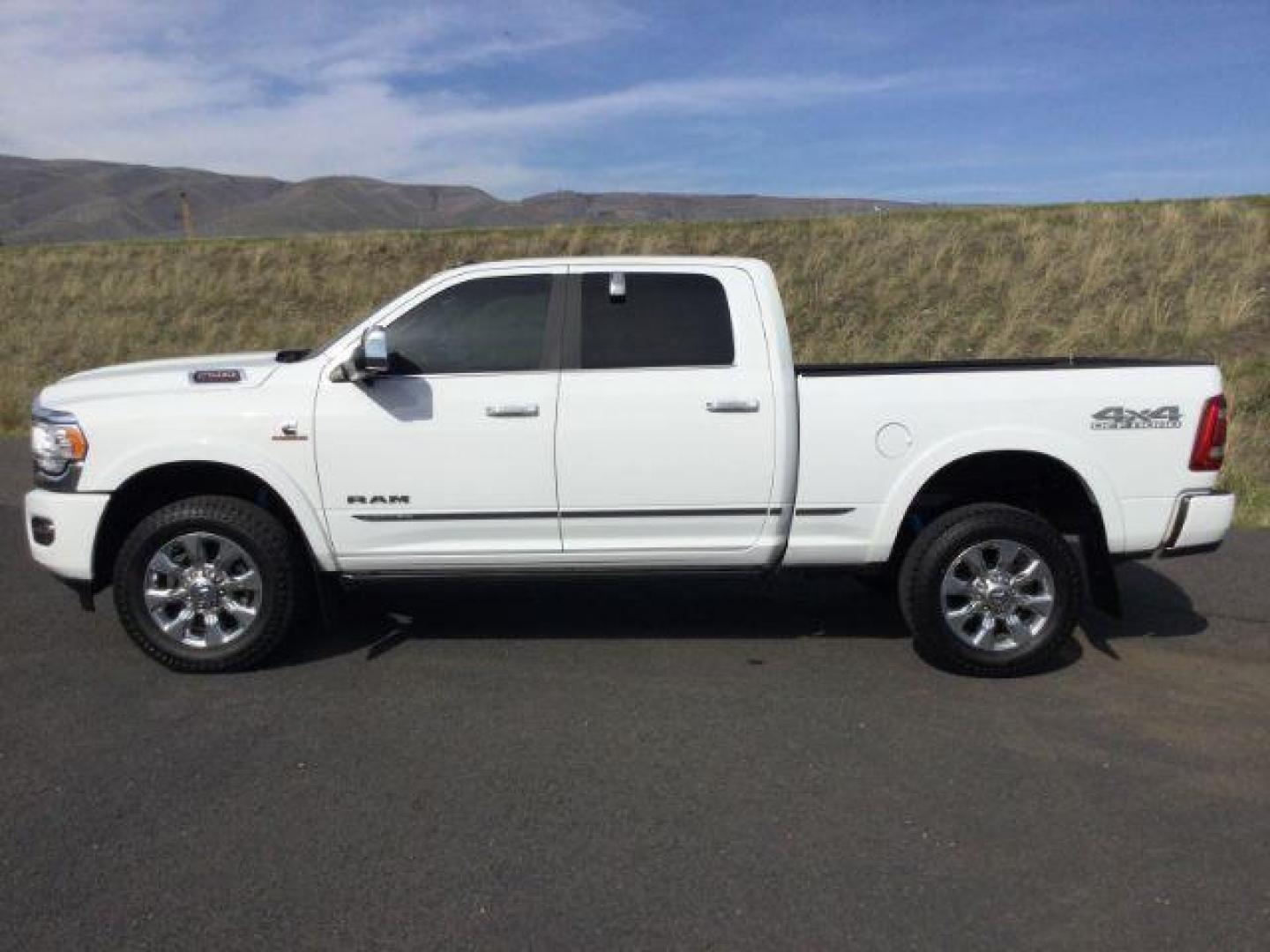 2019 Bright White Clear Coat /Black, premium leather RAM 2500 Limited Crew Cab SWB 4WD (3C6UR5SL2KG) with an 6.7L L6 OHV 24V TURBO DIESEL engine, 6-Speed Automatic transmission, located at 1801 Main Street, Lewiston, 83501, (208) 743-9371, 46.417065, -117.004799 - Photo#1