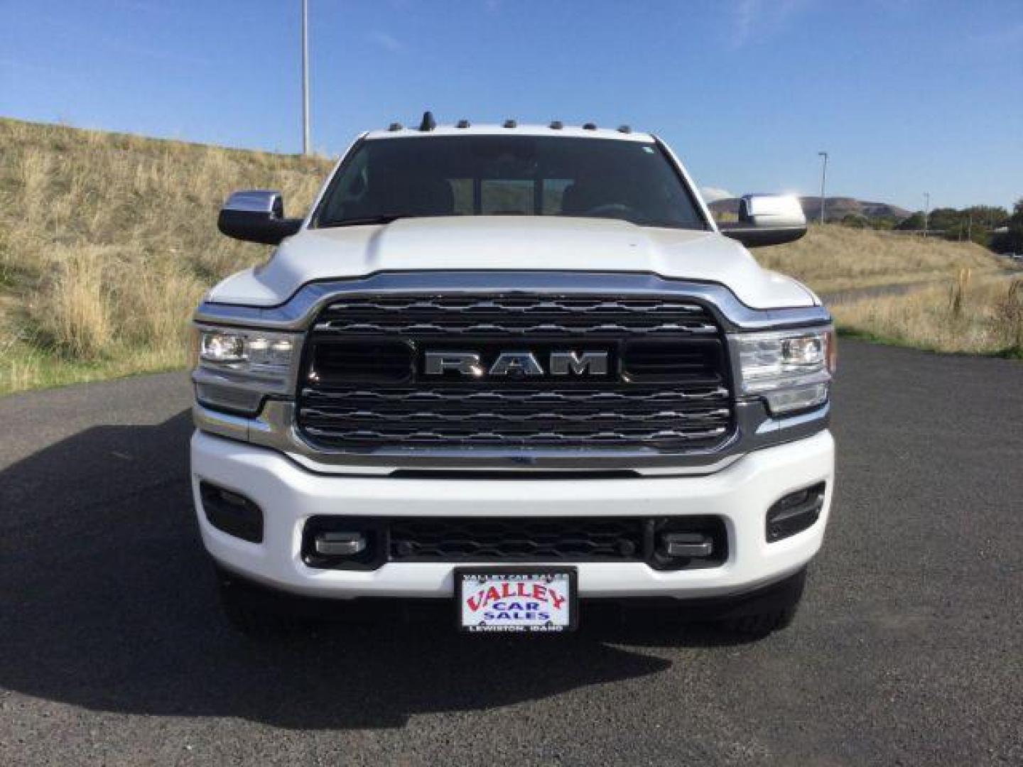 2019 Bright White Clear Coat /Black, premium leather RAM 2500 Limited Crew Cab SWB 4WD (3C6UR5SL2KG) with an 6.7L L6 OHV 24V TURBO DIESEL engine, 6-Speed Automatic transmission, located at 1801 Main Street, Lewiston, 83501, (208) 743-9371, 46.417065, -117.004799 - Photo#2