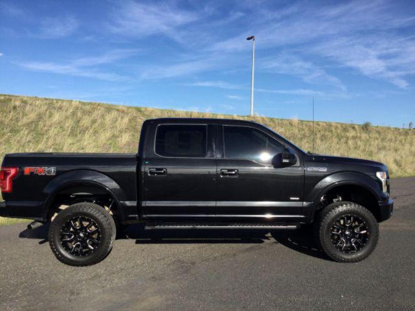 2015 Tuxedo Black Metallic /BLACK LEATHER Ford F-150 Lariat SuperCrew 5.5-ft. Bed 4WD (1FTEW1EG7FK) with an 3.5L V6 TURBO engine, 6-Speed Automatic transmission, located at 1801 Main Street, Lewiston, 83501, (208) 743-9371, 46.417065, -117.004799 - Photo#11