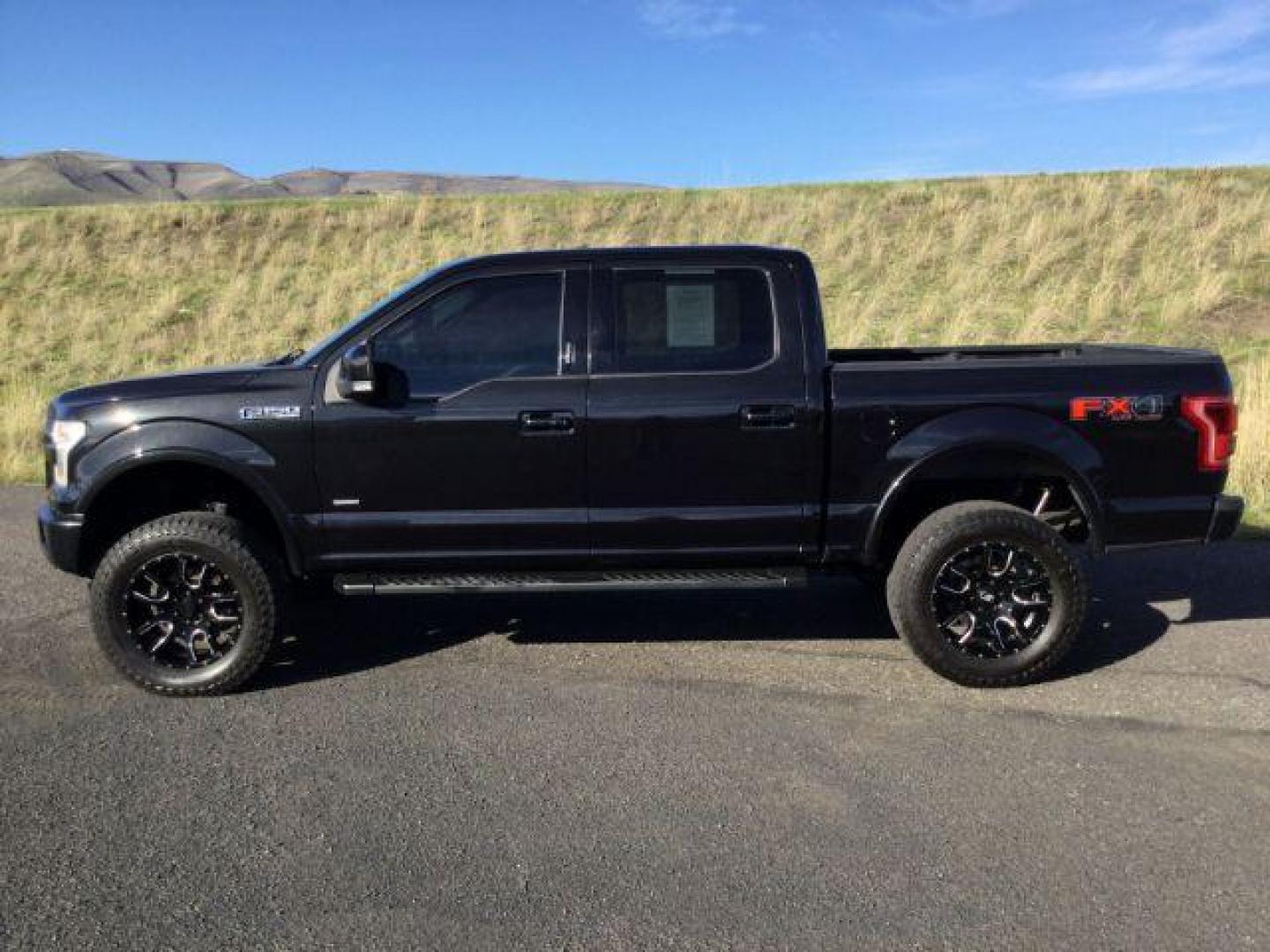 2015 Tuxedo Black Metallic /BLACK LEATHER Ford F-150 Lariat SuperCrew 5.5-ft. Bed 4WD (1FTEW1EG7FK) with an 3.5L V6 TURBO engine, 6-Speed Automatic transmission, located at 1801 Main Street, Lewiston, 83501, (208) 743-9371, 46.417065, -117.004799 - Photo#1