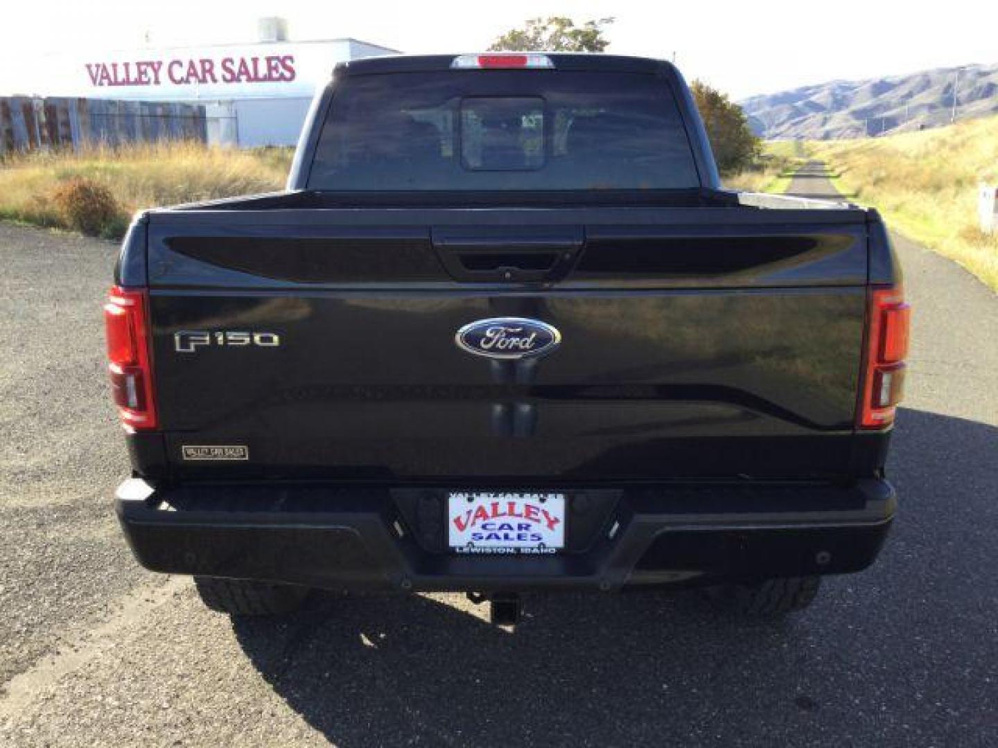 2015 Tuxedo Black Metallic /BLACK LEATHER Ford F-150 Lariat SuperCrew 5.5-ft. Bed 4WD (1FTEW1EG7FK) with an 3.5L V6 TURBO engine, 6-Speed Automatic transmission, located at 1801 Main Street, Lewiston, 83501, (208) 743-9371, 46.417065, -117.004799 - Photo#22