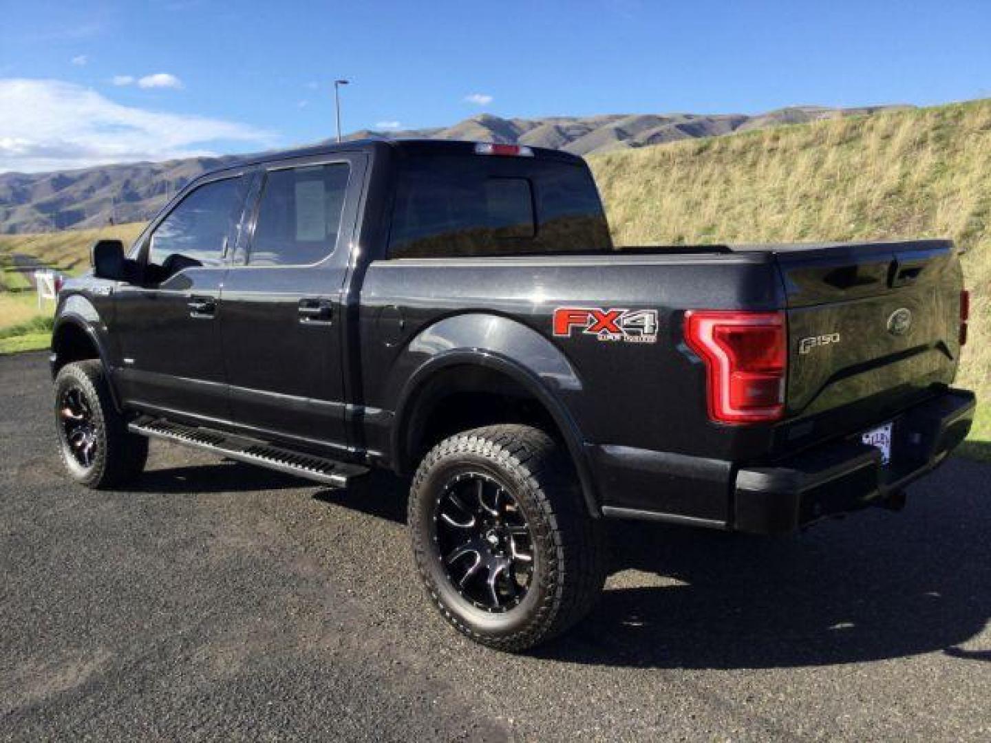 2015 Tuxedo Black Metallic /BLACK LEATHER Ford F-150 Lariat SuperCrew 5.5-ft. Bed 4WD (1FTEW1EG7FK) with an 3.5L V6 TURBO engine, 6-Speed Automatic transmission, located at 1801 Main Street, Lewiston, 83501, (208) 743-9371, 46.417065, -117.004799 - Photo#2