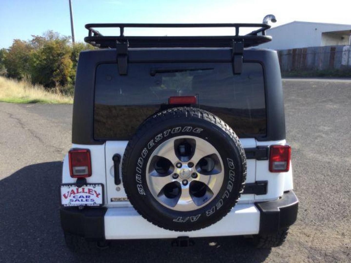 2016 Bright White Clear Coat /Black, leather Jeep Wrangler Unlimited Sahara 4WD (1C4BJWEG3GL) with an 3.6L V6 DOHC 24V FFV engine, 5-Speed Automatic transmission, located at 1801 Main Street, Lewiston, 83501, (208) 743-9371, 46.417065, -117.004799 - Photo#13