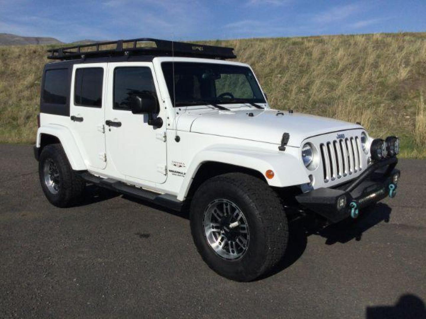 2016 Bright White Clear Coat /Black, leather Jeep Wrangler Unlimited Sahara 4WD (1C4BJWEG3GL) with an 3.6L V6 DOHC 24V FFV engine, 5-Speed Automatic transmission, located at 1801 Main Street, Lewiston, 83501, (208) 743-9371, 46.417065, -117.004799 - Photo#14