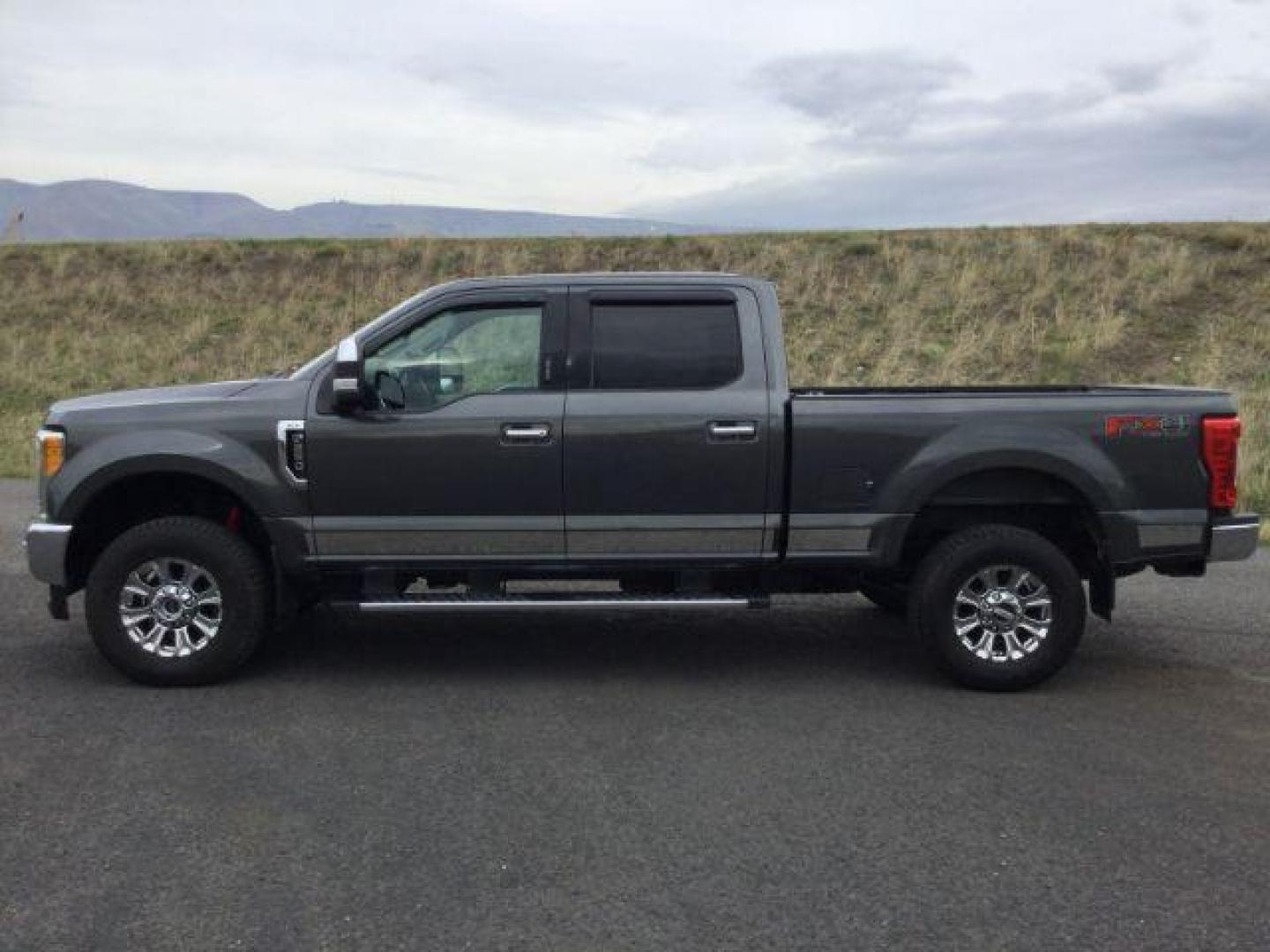 2017 Magnetic Metallic /GRAY CLOTH Ford F-250 SD XLT Crew Cab 4WD (1FT7W2B68HE) with an 6.2L V8 OHV 16V engine, 6-Speed Automatic transmission, located at 1801 Main Street, Lewiston, 83501, (208) 743-9371, 46.417065, -117.004799 - Photo#1