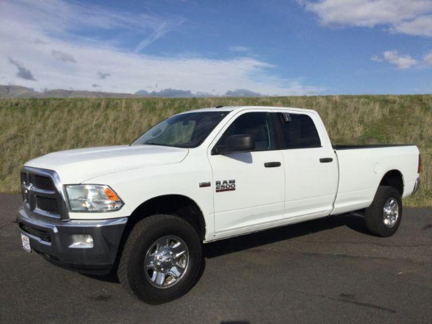 2017 Bright White Clear Coat /Brown Cloth RAM 2500 SLT Crew Cab LWB 4WD (3C6TR5JT7HG) with an 5.7L V8 OHV 16V engine, 6-Speed Automatic transmission, located at 1801 Main Street, Lewiston, 83501, (208) 743-9371, 46.417065, -117.004799 - Photo#0