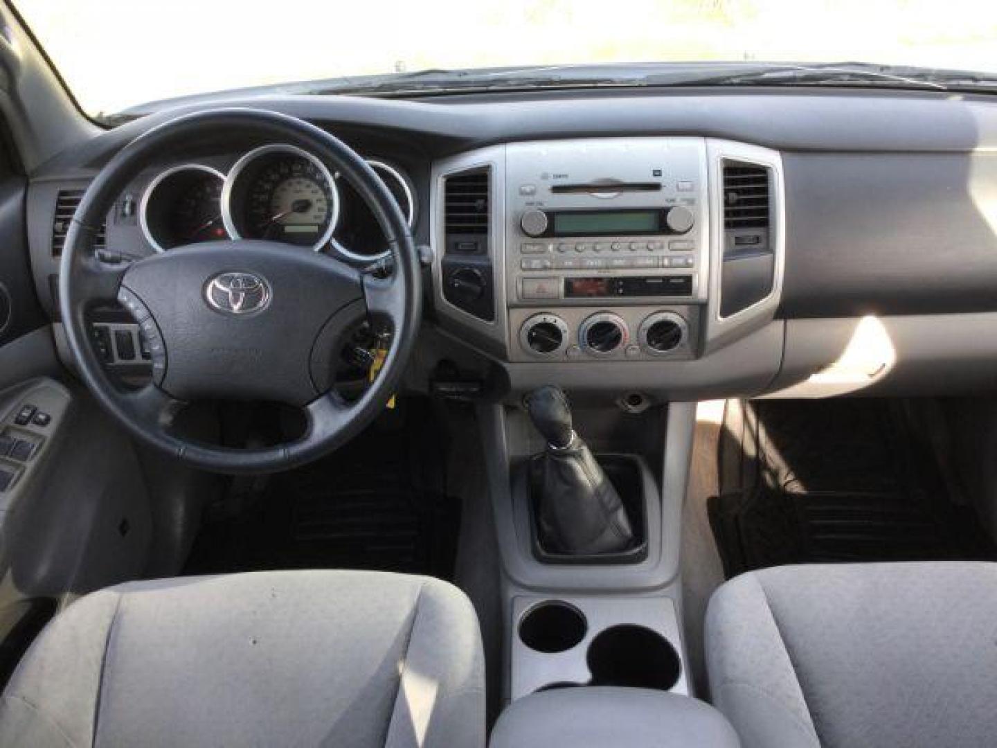 2006 Black Sand Pearl /Graphite Cloth Interior Toyota Tacoma Double Cab V6 4WD (5TELU42N06Z) with an 4.0L V6 DOHC 24V engine, 6-Speed Manual transmission, located at 1801 Main Street, Lewiston, 83501, (208) 743-9371, 46.417065, -117.004799 - Photo#10