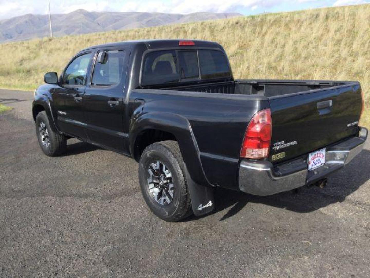 2006 Black Sand Pearl /Graphite Cloth Interior Toyota Tacoma Double Cab V6 4WD (5TELU42N06Z) with an 4.0L V6 DOHC 24V engine, 6-Speed Manual transmission, located at 1801 Main Street, Lewiston, 83501, (208) 743-9371, 46.417065, -117.004799 - Photo#2