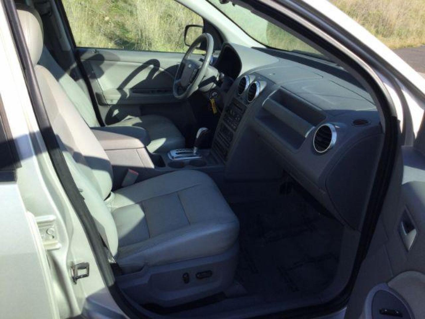 2006 Silver Metallic /Pebble Leather Interior Ford Freestyle SEL AWD (1FMDK05116G) with an 3.0L V6 DOHC 24V engine, Continuously Variable Transmission transmission, located at 1801 Main Street, Lewiston, 83501, (208) 743-9371, 46.417065, -117.004799 - Photo#19