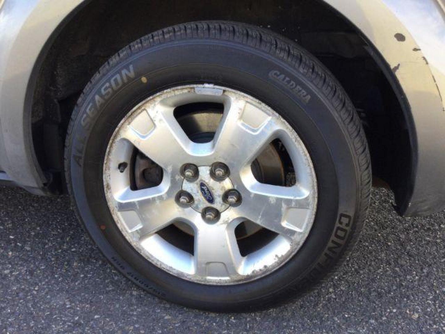 2006 Silver Metallic /Pebble Leather Interior Ford Freestyle SEL AWD (1FMDK05116G) with an 3.0L V6 DOHC 24V engine, Continuously Variable Transmission transmission, located at 1801 Main Street, Lewiston, 83501, (208) 743-9371, 46.417065, -117.004799 - Photo#21