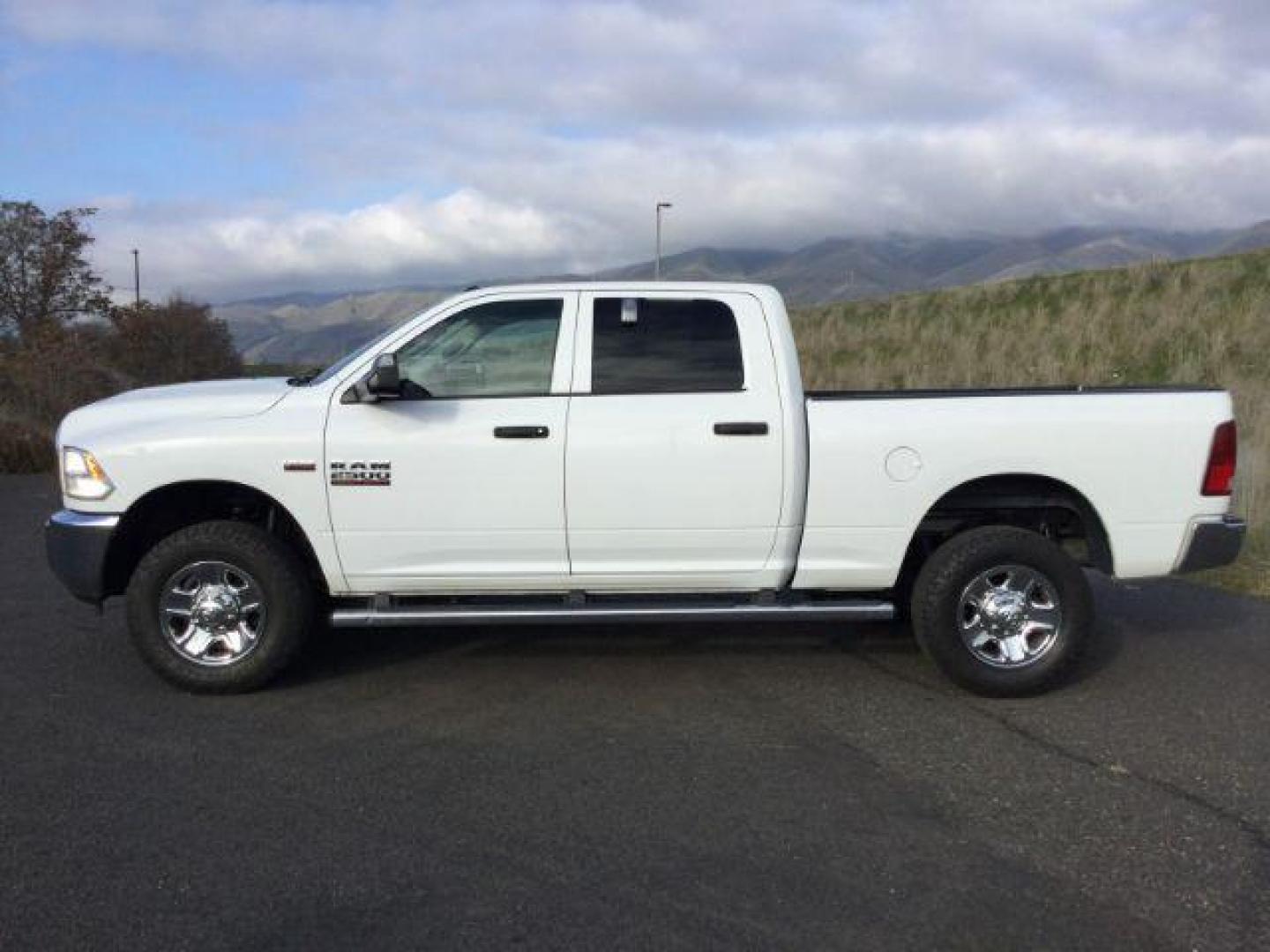 2017 Bright White Clear Coat /Black/Diesel Gray, cloth RAM 2500 Tradesman Crew Cab SWB 4WD (3C6UR5CJ3HG) with an 6.4L V8 engine, 6-Speed Automatic transmission, located at 1801 Main Street, Lewiston, 83501, (208) 743-9371, 46.417065, -117.004799 - Photo#1