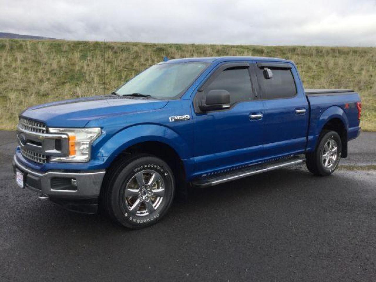 2018 Lightning Blue Metallic /Medium Earth Gray, cloth Ford F-150 XLT SuperCrew 5.5-ft. Bed 4WD (1FTEW1E57JK) with an 5.0L V8 OHV 32V engine, 10-speed automatic transmission, located at 1801 Main Street, Lewiston, 83501, (208) 743-9371, 46.417065, -117.004799 - Photo#0