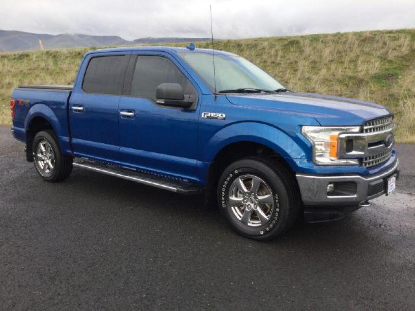 2018 Lightning Blue Metallic /Medium Earth Gray, cloth Ford F-150 XLT SuperCrew 5.5-ft. Bed 4WD (1FTEW1E57JK) with an 5.0L V8 OHV 32V engine, 10-speed automatic transmission, located at 1801 Main Street, Lewiston, 83501, (208) 743-9371, 46.417065, -117.004799 - Photo#19