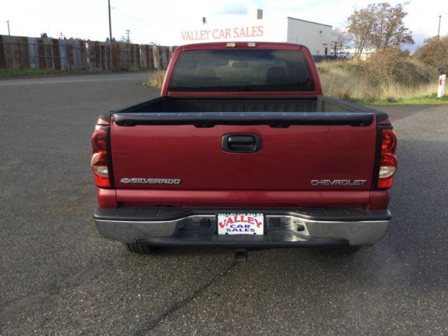 2005 Sport Red Metallic /Dark Charcoal Cloth Interior Chevrolet Silverado 1500 Ext. Cab Short Bed 4WD (2GCEK19VX51) with an 4.8L V8 OHV 16V engine, 4-Speed Automatic transmission, located at 1801 Main Street, Lewiston, 83501, (208) 743-9371, 46.417065, -117.004799 - Photo#2