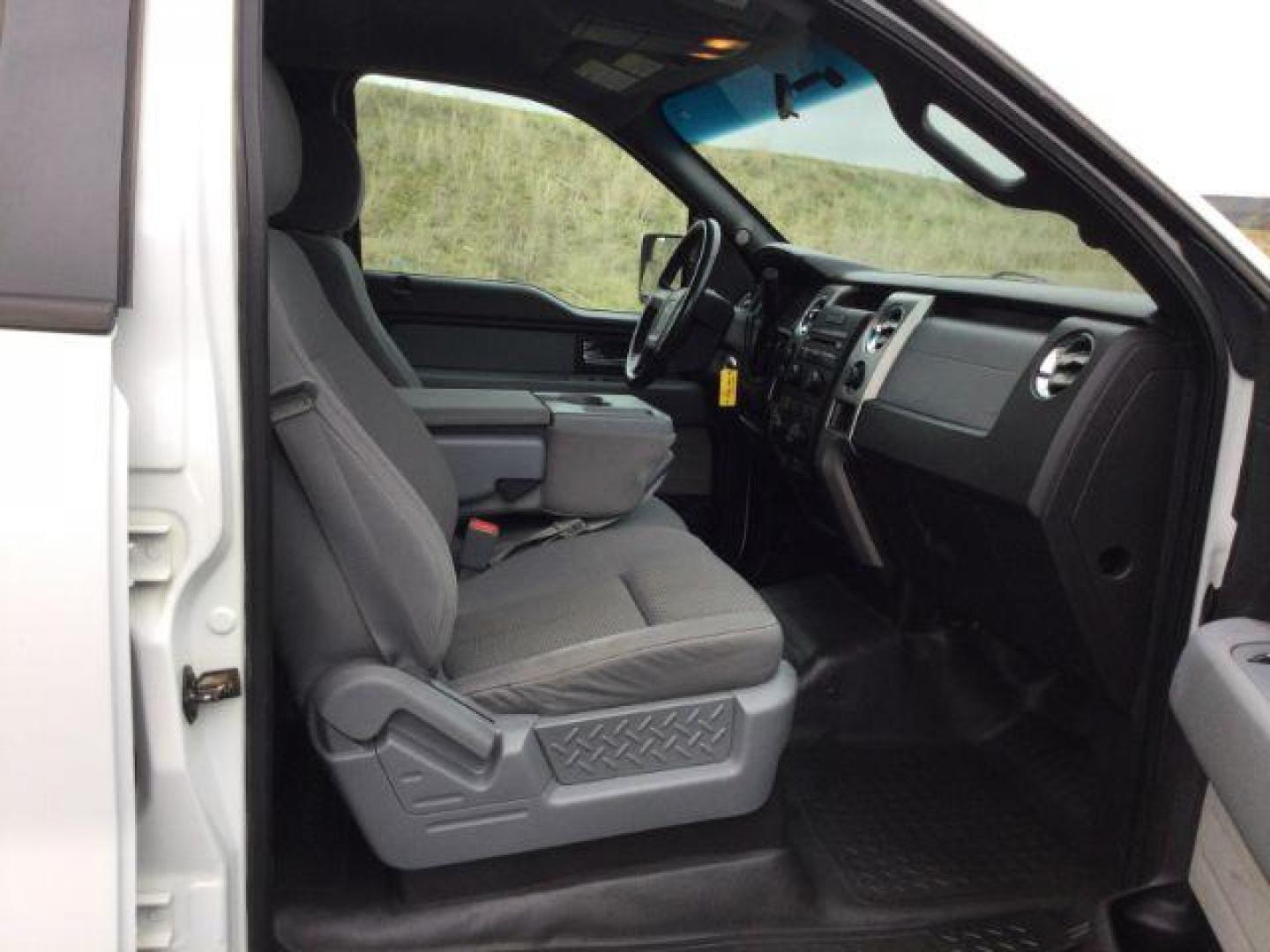 2012 Oxford White /Steel Gray Cloth Interior Ford F-150 XLT SuperCrew 6.5-ft. Bed 4WD (1FTFW1EF4CF) with an 5.0L V8 engine, 6-Speed Automatic transmission, located at 1801 Main Street, Lewiston, 83501, (208) 743-9371, 46.417065, -117.004799 - Photo#14