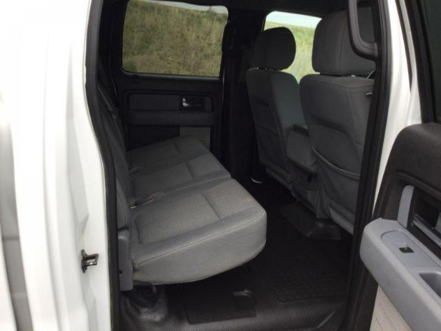 2012 Oxford White /Steel Gray Cloth Interior Ford F-150 XLT SuperCrew 6.5-ft. Bed 4WD (1FTFW1EF4CF) with an 5.0L V8 engine, 6-Speed Automatic transmission, located at 1801 Main Street, Lewiston, 83501, (208) 743-9371, 46.417065, -117.004799 - Photo#15