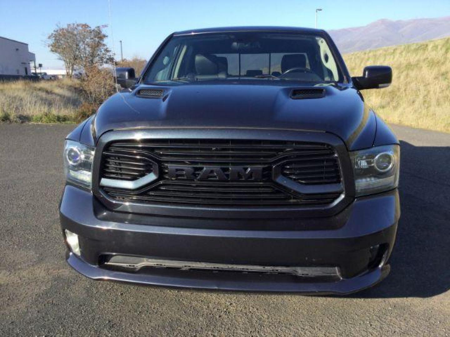 2018 Granite Crystal Metallic Clear Coat /BLACK LEATHER/CLOTH RAM 1500 Sport Crew Cab SWB 4WD (1C6RR7MT3JS) with an 5.7L V8 OHV 16V engine, 8-Speed Automatic transmission, located at 1801 Main Street, Lewiston, 83501, (208) 743-9371, 46.417065, -117.004799 - Photo#15