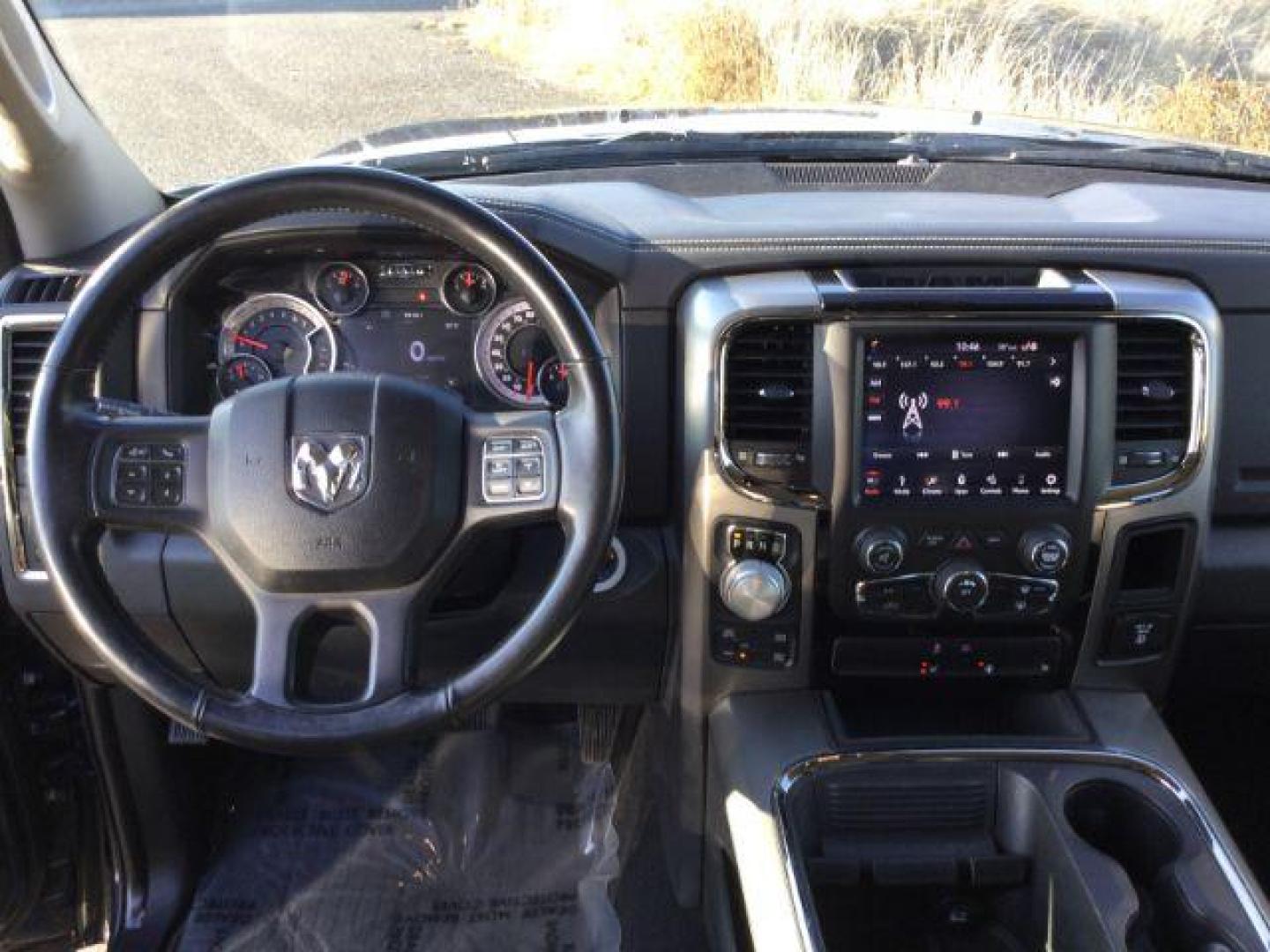 2018 Granite Crystal Metallic Clear Coat /BLACK LEATHER/CLOTH RAM 1500 Sport Crew Cab SWB 4WD (1C6RR7MT3JS) with an 5.7L V8 OHV 16V engine, 8-Speed Automatic transmission, located at 1801 Main Street, Lewiston, 83501, (208) 743-9371, 46.417065, -117.004799 - Photo#7