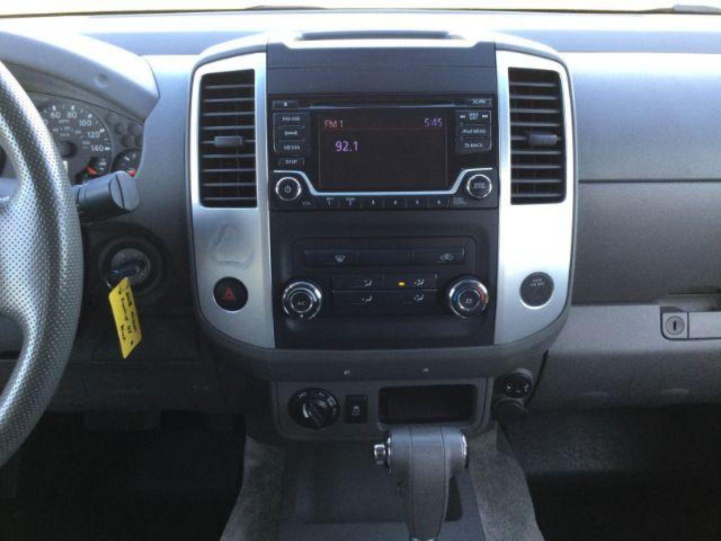 2018 Magnetic Black Nissan Frontier SV Crew Cab 5AT 4X4 (1N6AD0EV1JN) with an 4.0L V6 DOHC 24V engine, 5-Speed Automatic transmission, located at 1801 Main Street, Lewiston, 83501, (208) 743-9371, 46.417065, -117.004799 - Photo#7