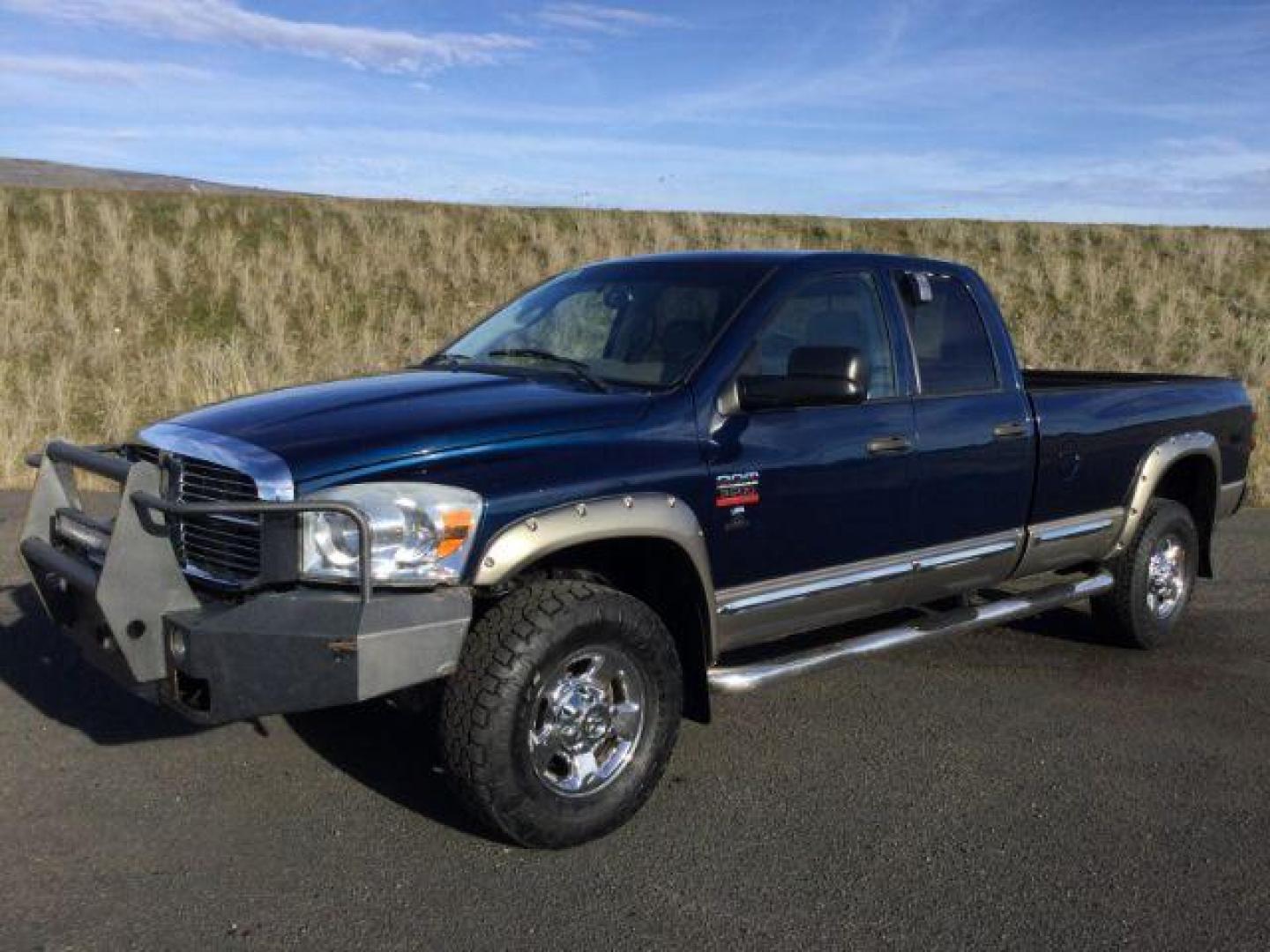 2008 Blue/Gold /Khaki Leather Dodge Ram 3500 Laramie Quad Cab 4WD (3D7MX38A68G) with an 6.7L L6 OHV 24V TURBO DIESEL engine, 6-Speed Manual Transmission transmission, located at 1801 Main Street, Lewiston, 83501, (208) 743-9371, 46.417065, -117.004799 - Photo#0