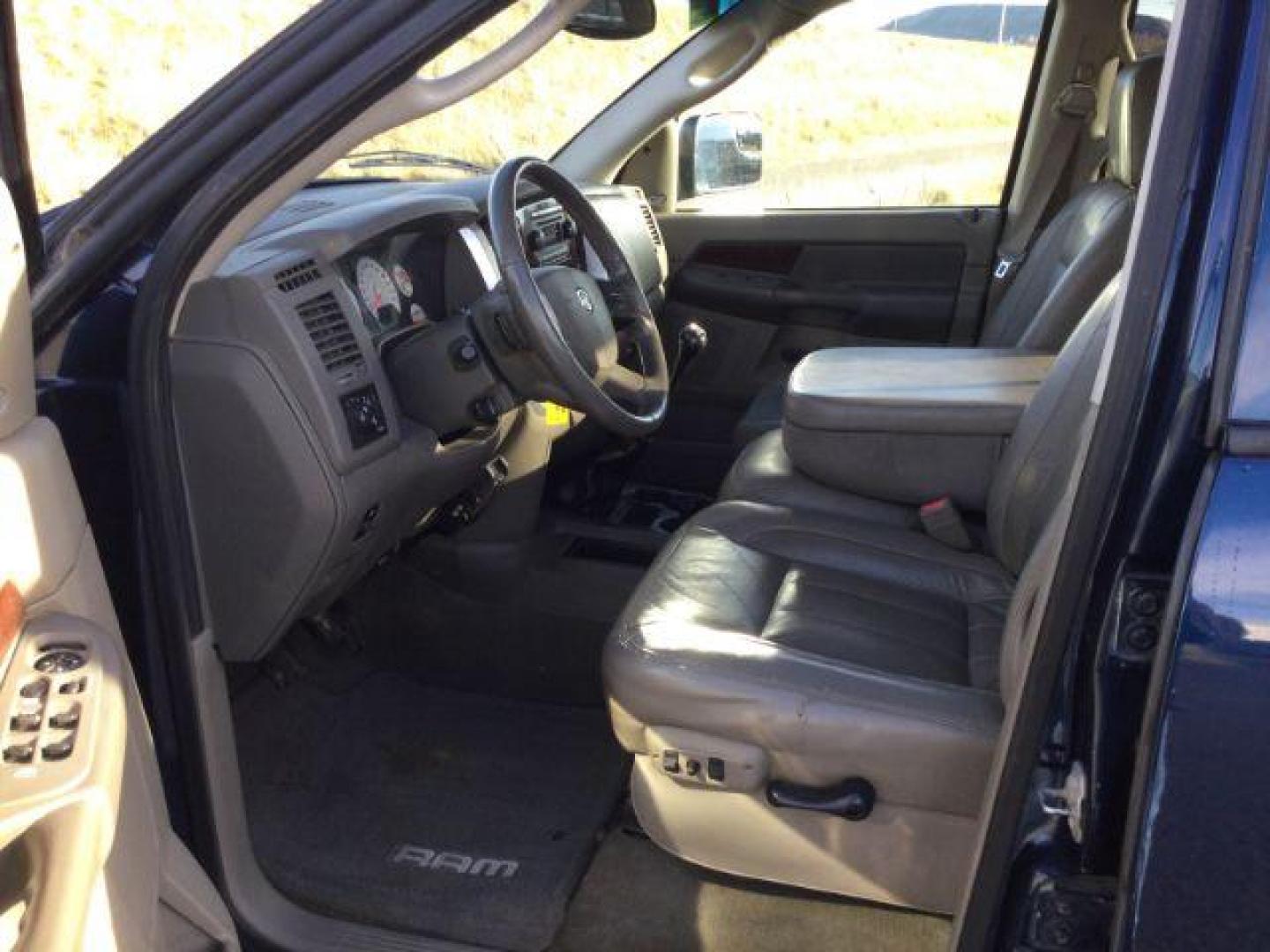 2008 Blue/Gold /Khaki Leather Dodge Ram 3500 Laramie Quad Cab 4WD (3D7MX38A68G) with an 6.7L L6 OHV 24V TURBO DIESEL engine, 6-Speed Manual Transmission transmission, located at 1801 Main Street, Lewiston, 83501, (208) 743-9371, 46.417065, -117.004799 - Photo#9