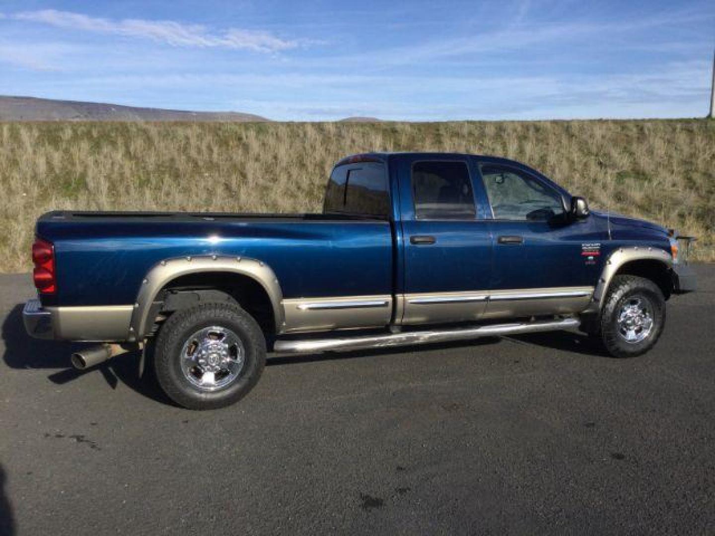 2008 Blue/Gold /Khaki Leather Dodge Ram 3500 Laramie Quad Cab 4WD (3D7MX38A68G) with an 6.7L L6 OHV 24V TURBO DIESEL engine, 6-Speed Manual Transmission transmission, located at 1801 Main Street, Lewiston, 83501, (208) 743-9371, 46.417065, -117.004799 - Photo#11